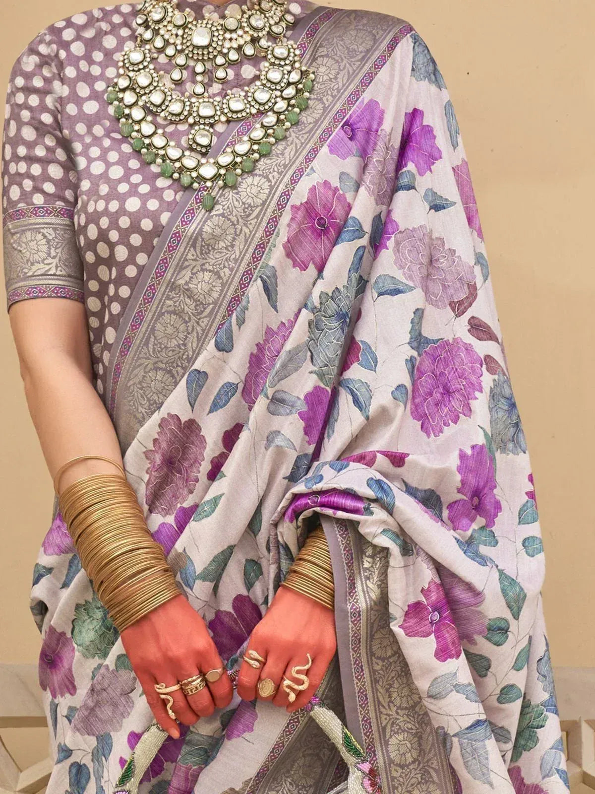 Purple floral saree with polka dot blouse, traditional Indian ethnic wear, gold jewelry