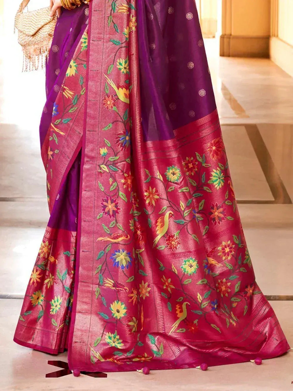 Purple and pink floral embroidered saree with bird motifs, perfect for ethnic occasions