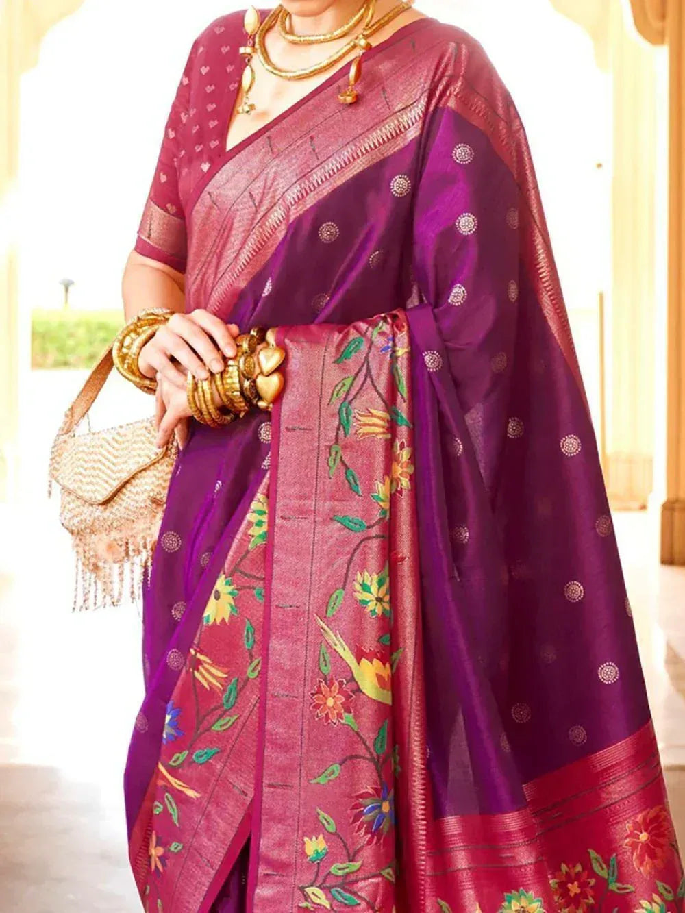 Purple and maroon floral embroidered saree with gold jewelry, perfect for Indian ethnic occasions