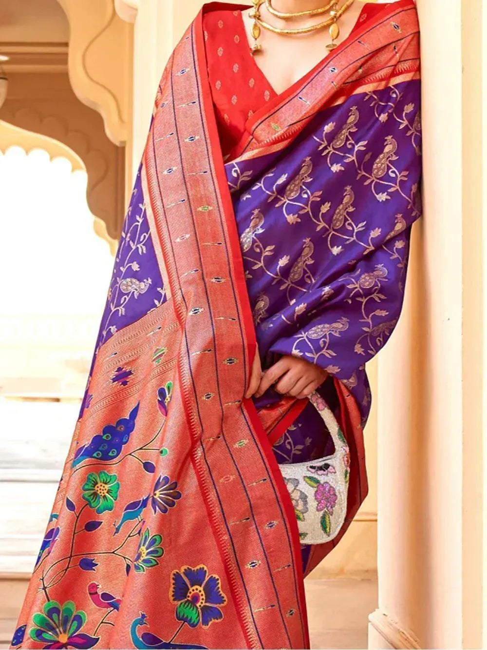 Purple and red ethnic saree with peacock and floral embroidery, perfect for Indian occasions
