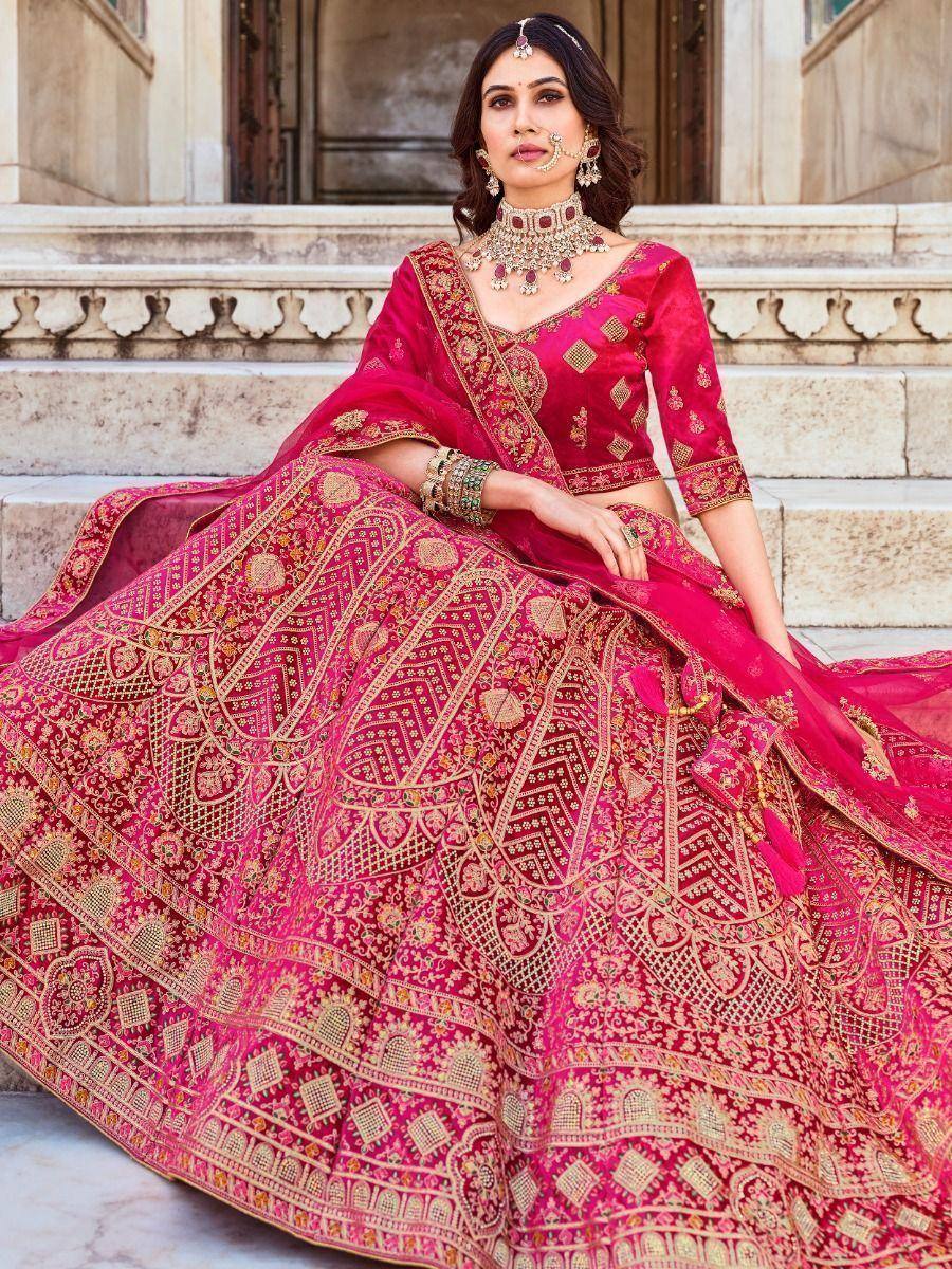 Pink embroidered lehenga choli with gold detailing, traditional Indian ethnic wear for weddings