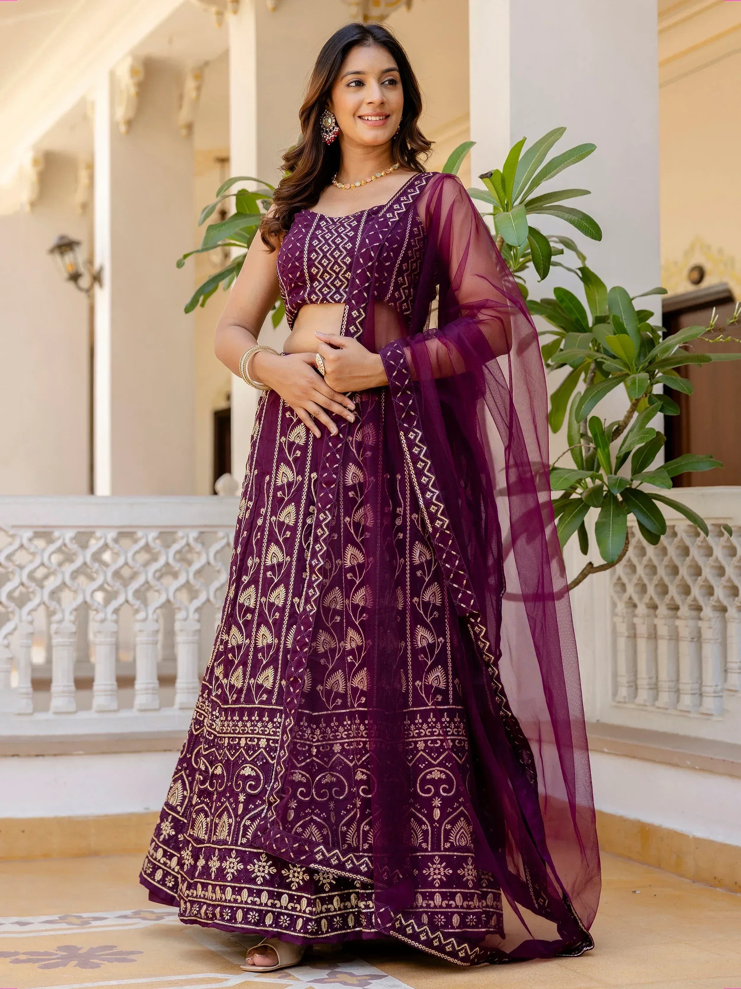 Purple embroidered lehenga choli with gold detailing, sheer dupatta, perfect for Indian ethnic wear occasions