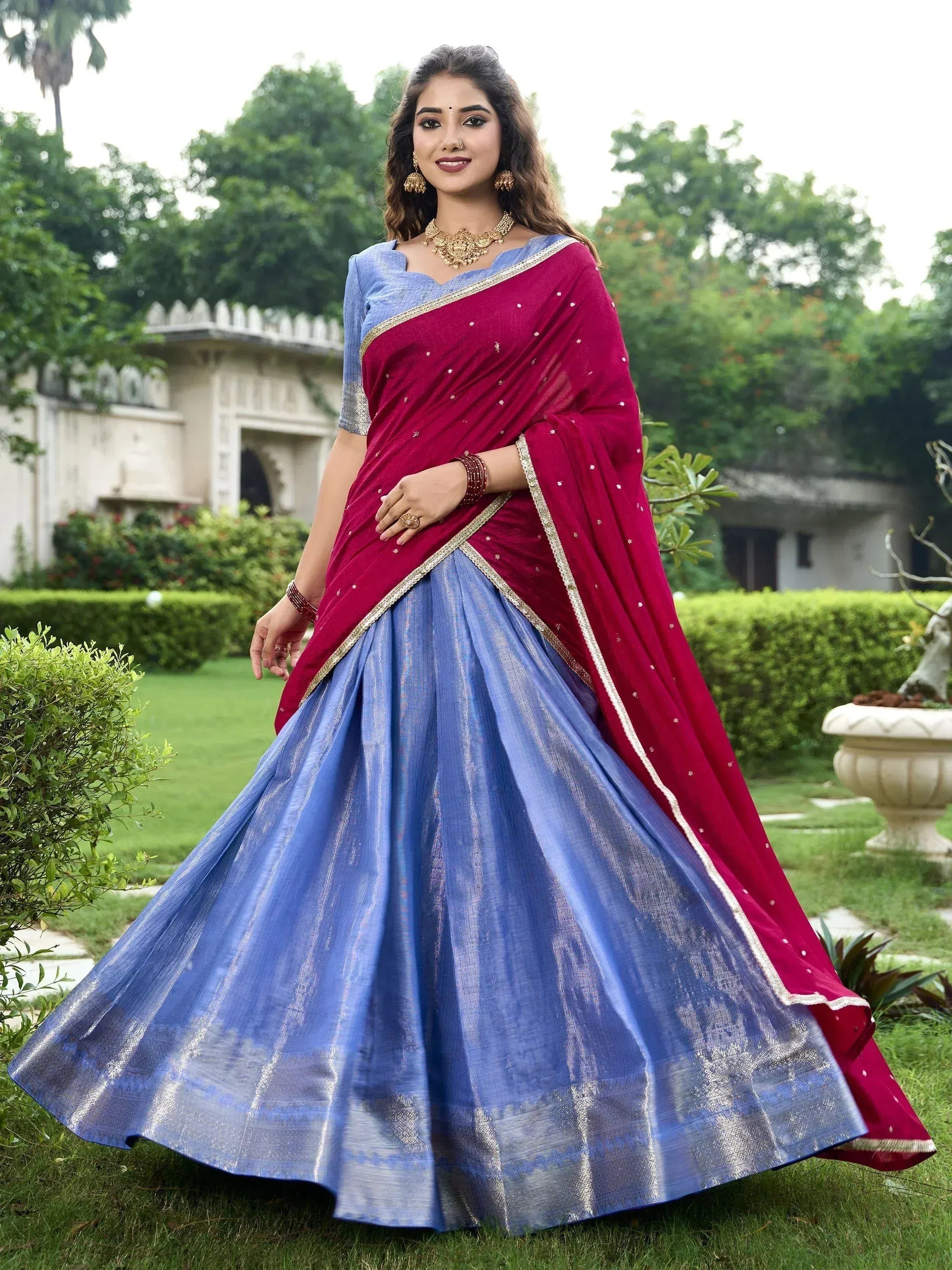 Blue and maroon designer lehenga choli with gold trim, perfect for Indian ethnic wear events