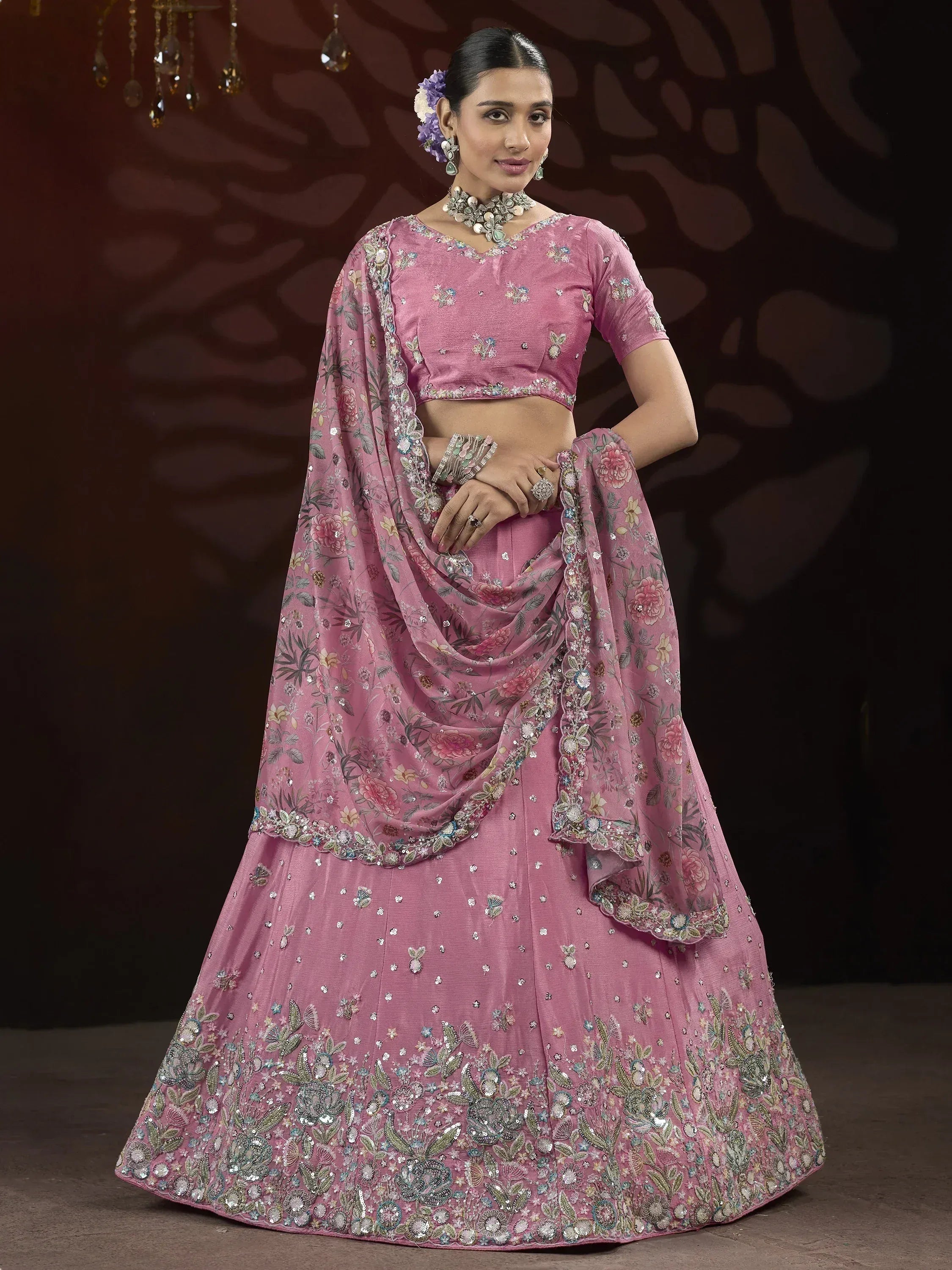 Pink floral embroidered lehenga choli with matching dupatta, perfect for Indian weddings and festive occasions