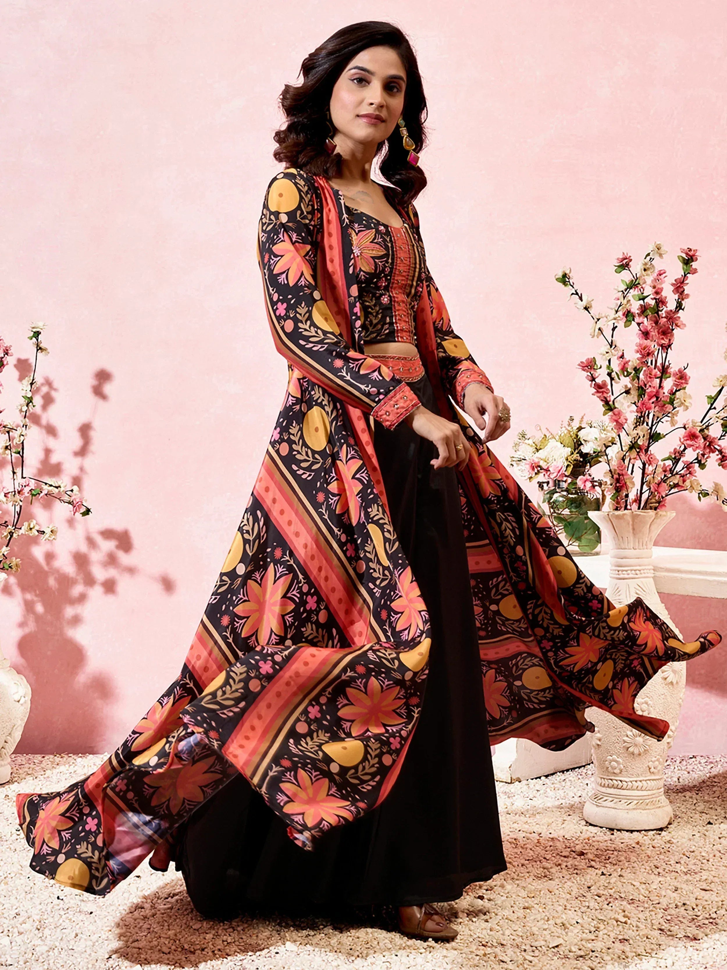 Floral printed ethnic gown with black palazzo, perfect for Indian festive occasions