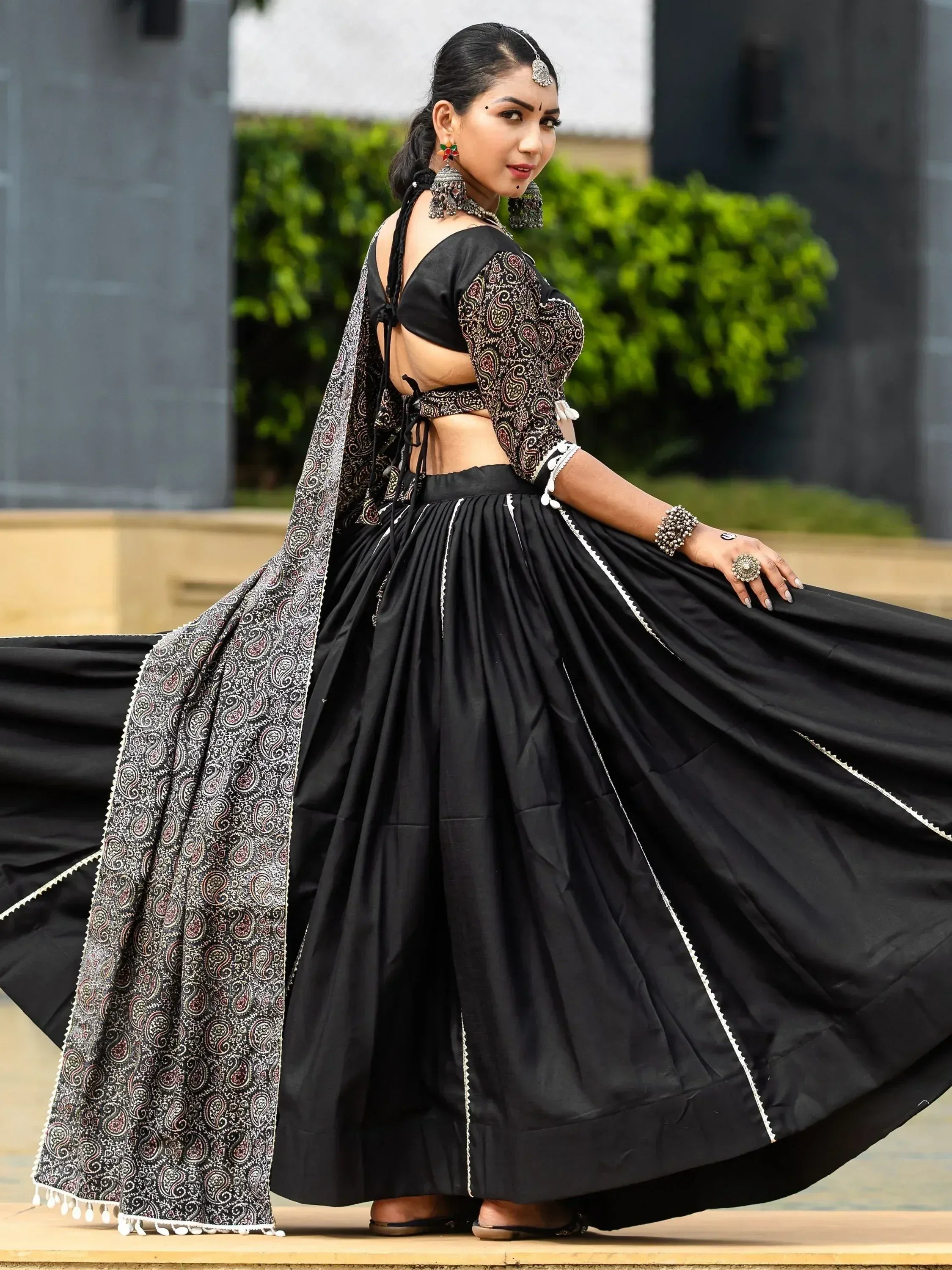 Black ethnic lehenga choli with paisley dupatta, perfect for Indian weddings and festive occasions