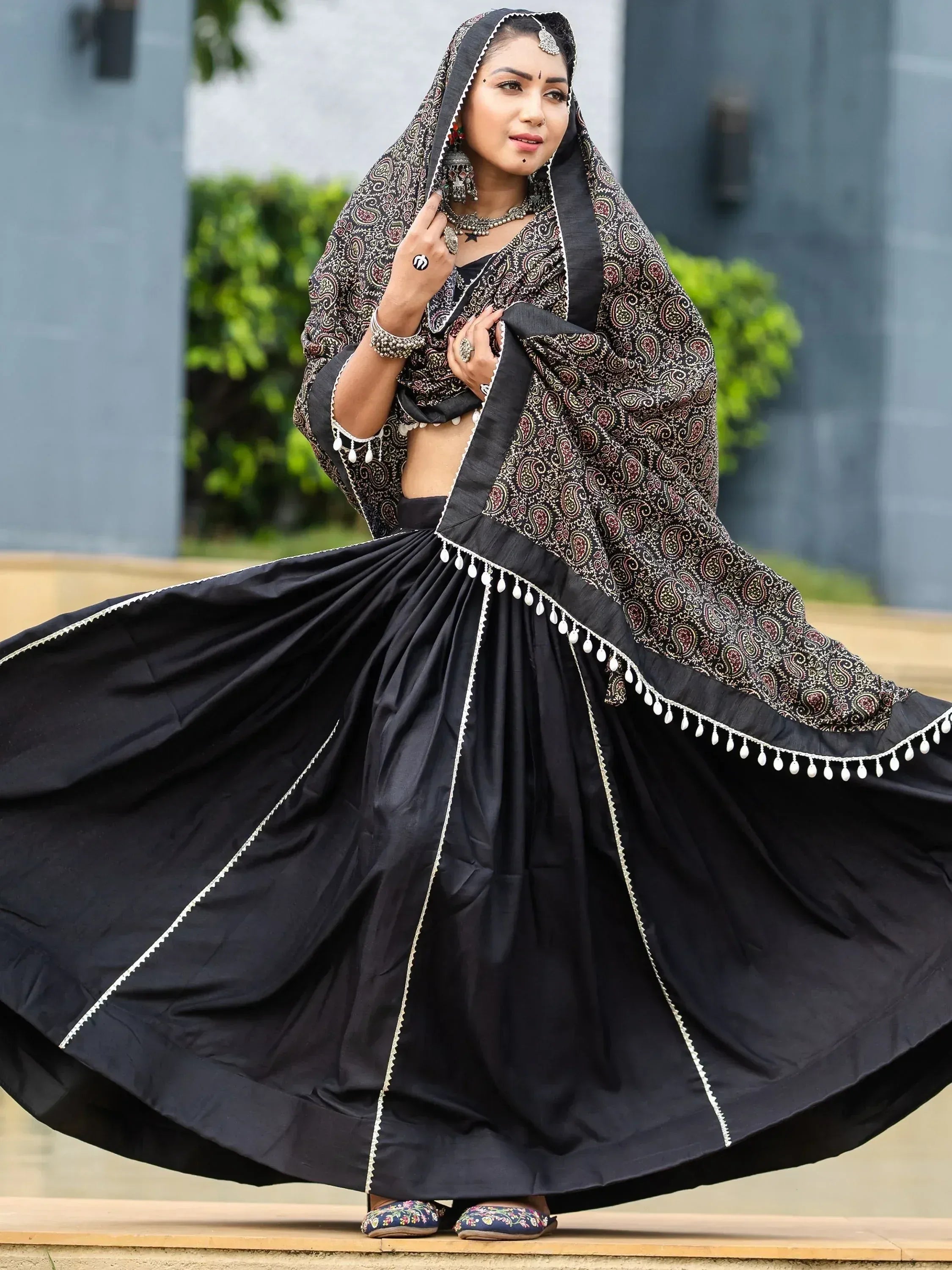 Black ethnic lehenga choli with paisley dupatta, traditional Indian wear for women