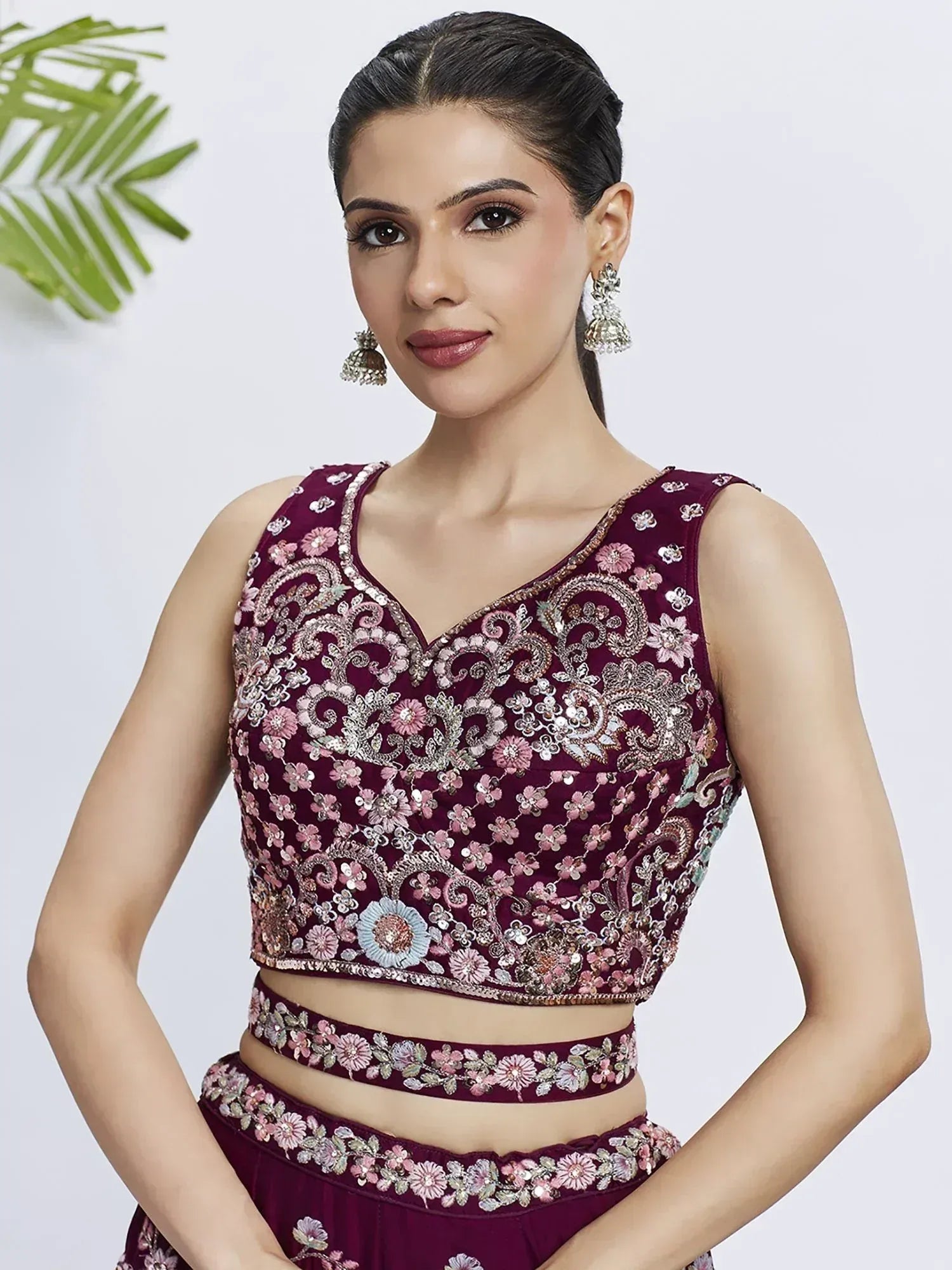Maroon embroidered lehenga choli with floral sequin work, perfect for Indian ethnic wear occasions