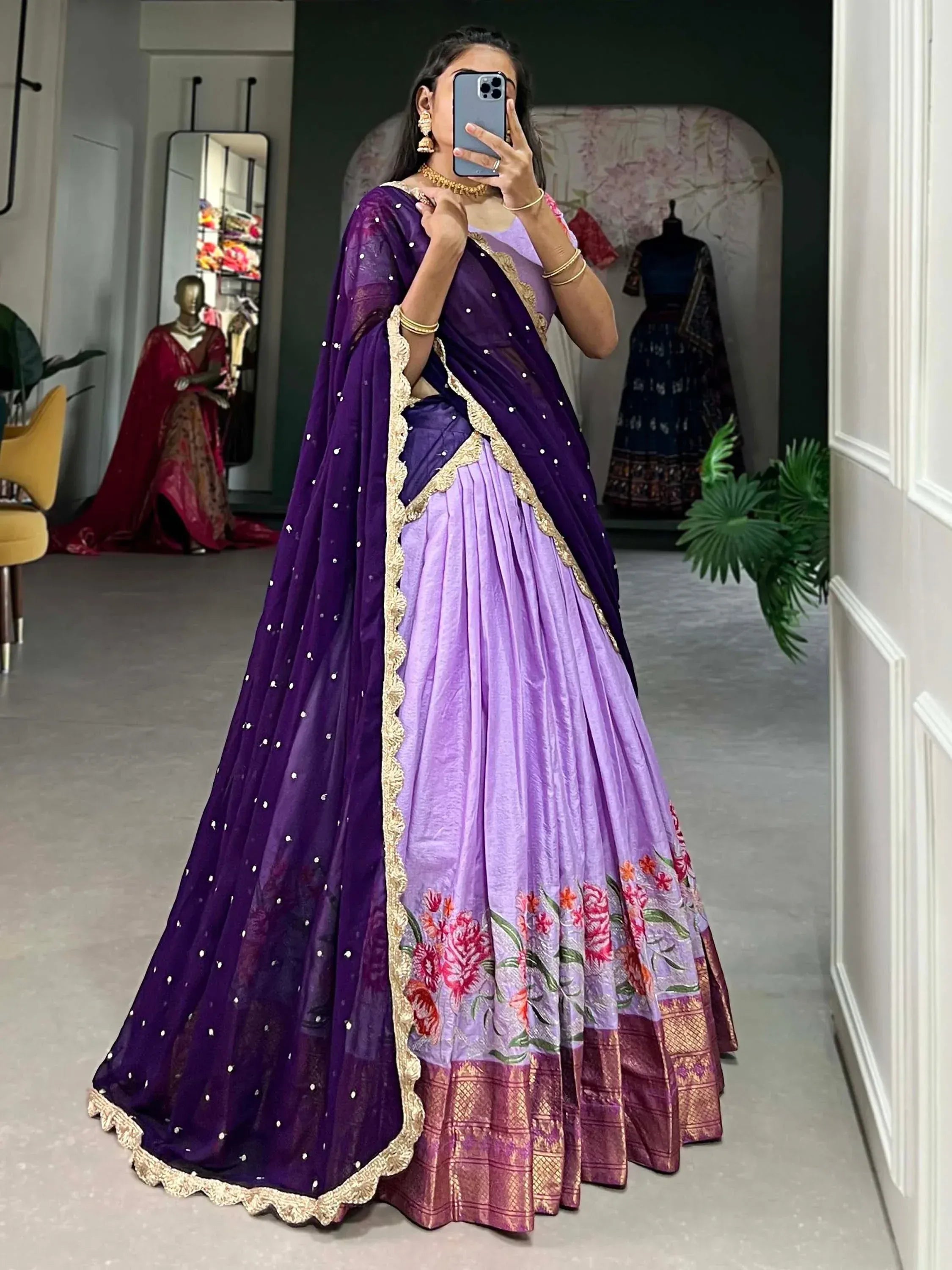 Purple and lavender lehenga choli with floral embroidery and gold trim, perfect for Indian ethnic wear