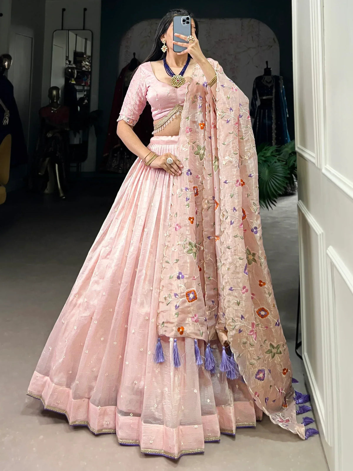 Pink embroidered lehenga choli with floral dupatta, perfect for Indian ethnic wear occasions