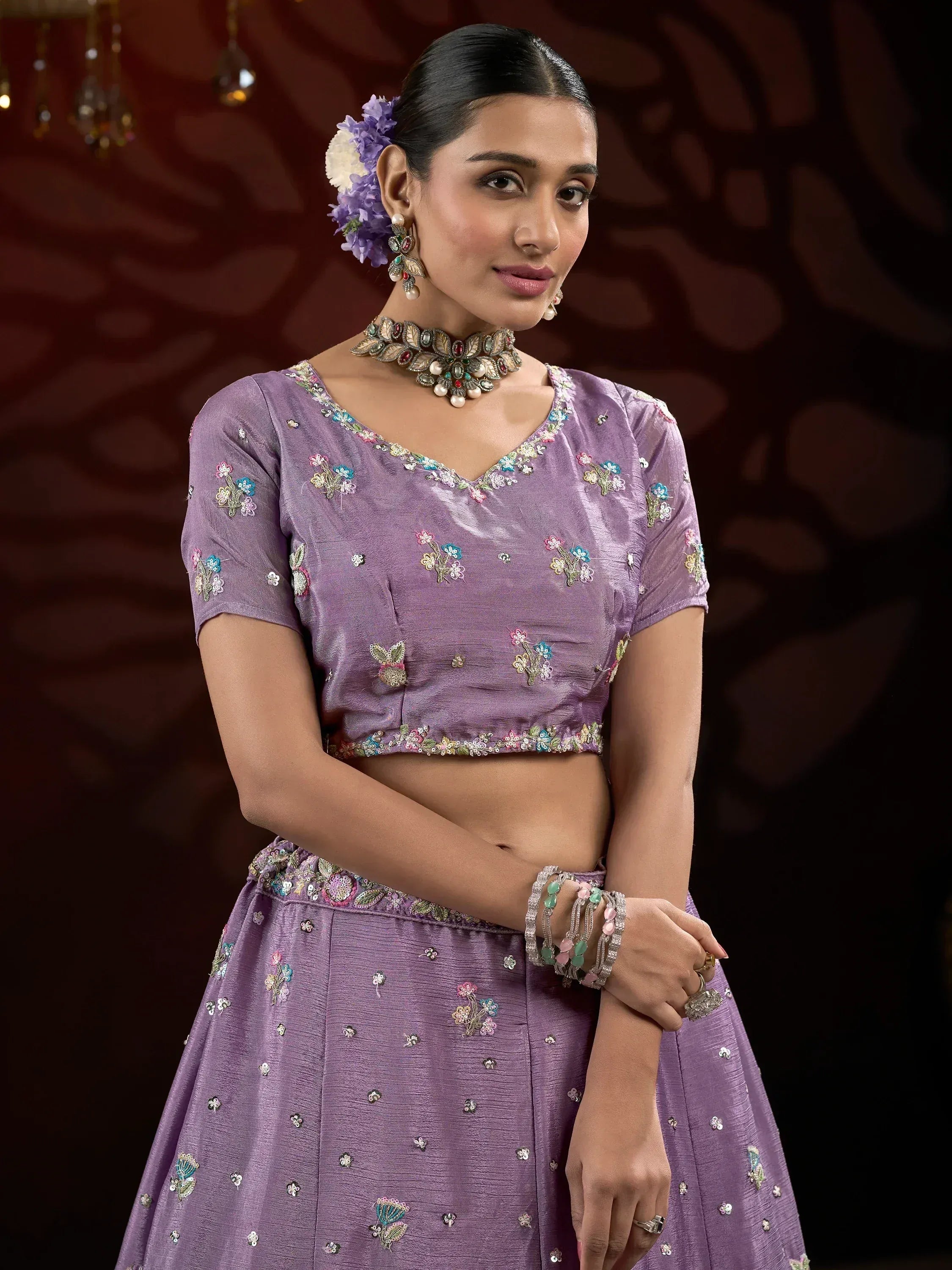 Purple floral embroidered lehenga choli with statement jewelry for Indian ethnic wear