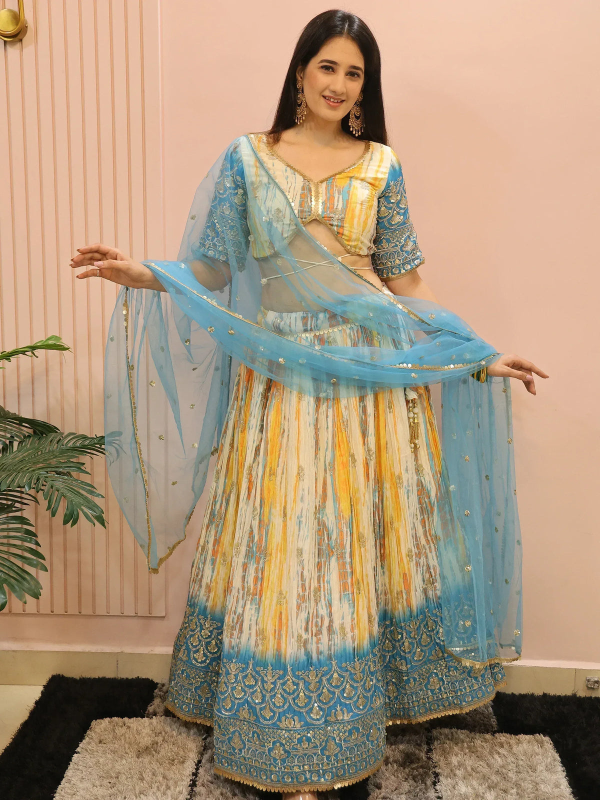 Blue and yellow designer lehenga choli with sequin work and sheer dupatta for Indian ethnic wear