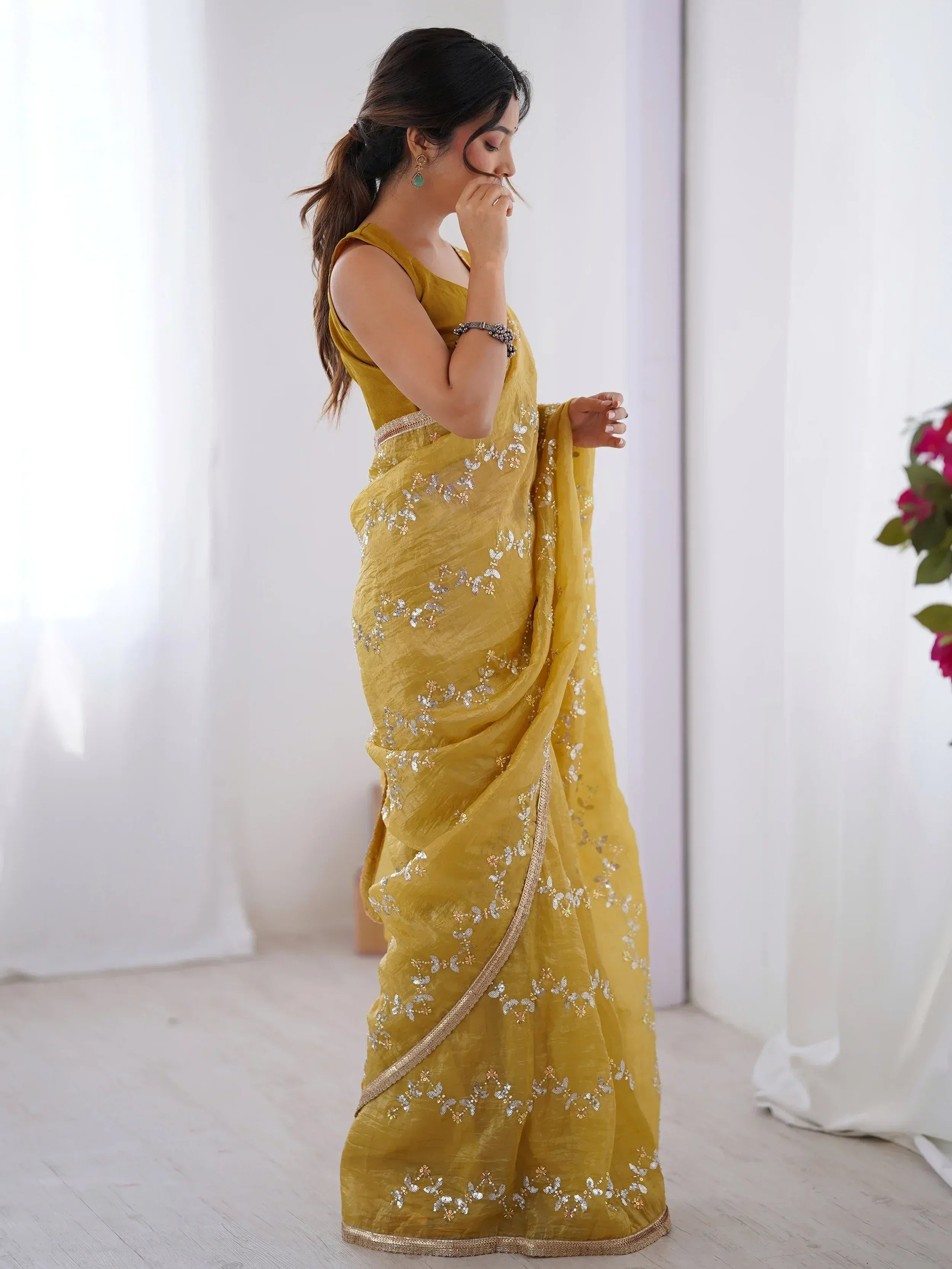 Yellow embroidered saree with sequin work, perfect for Indian ethnic wear and festive occasions