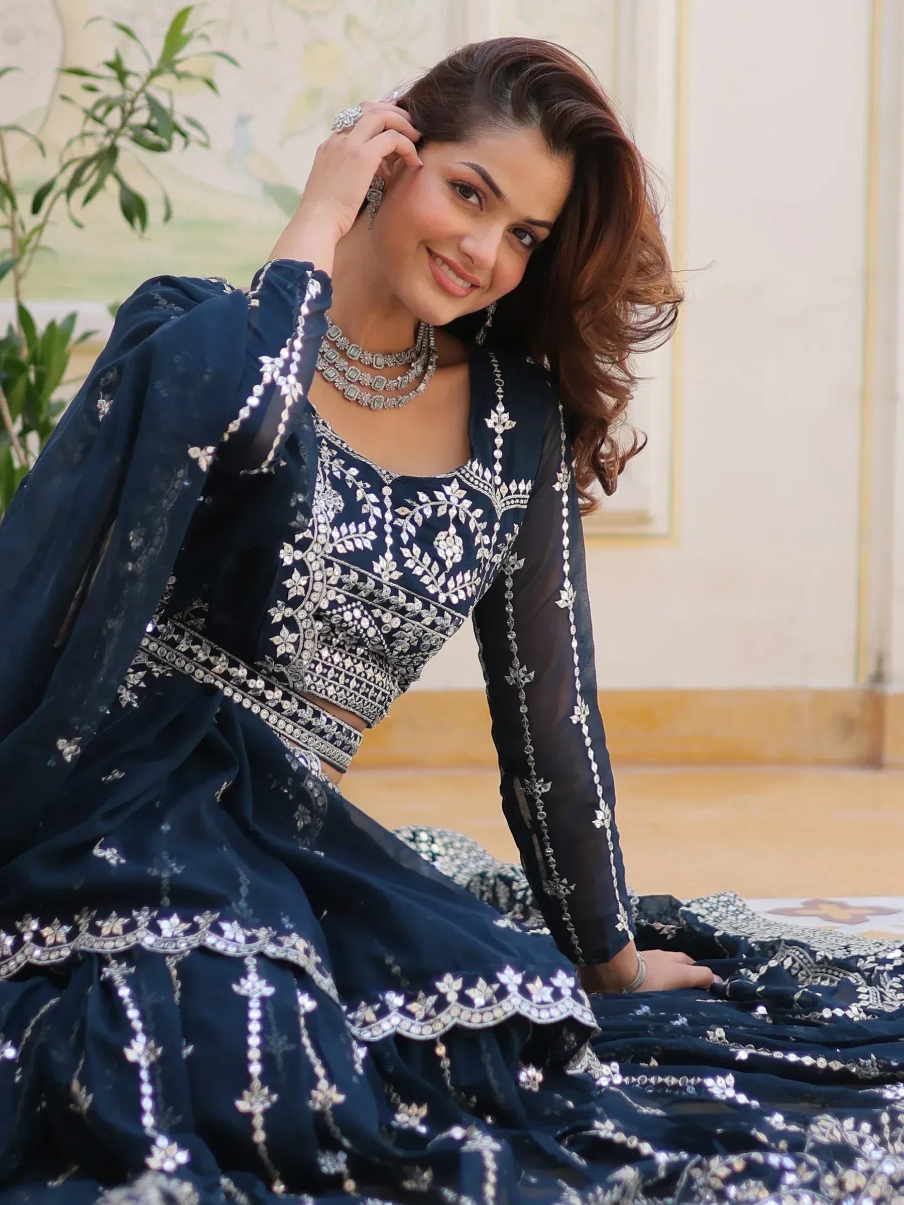Elegant navy blue lehenga choli with silver embroidery, perfect for Indian ethnic wear and festive occasions.