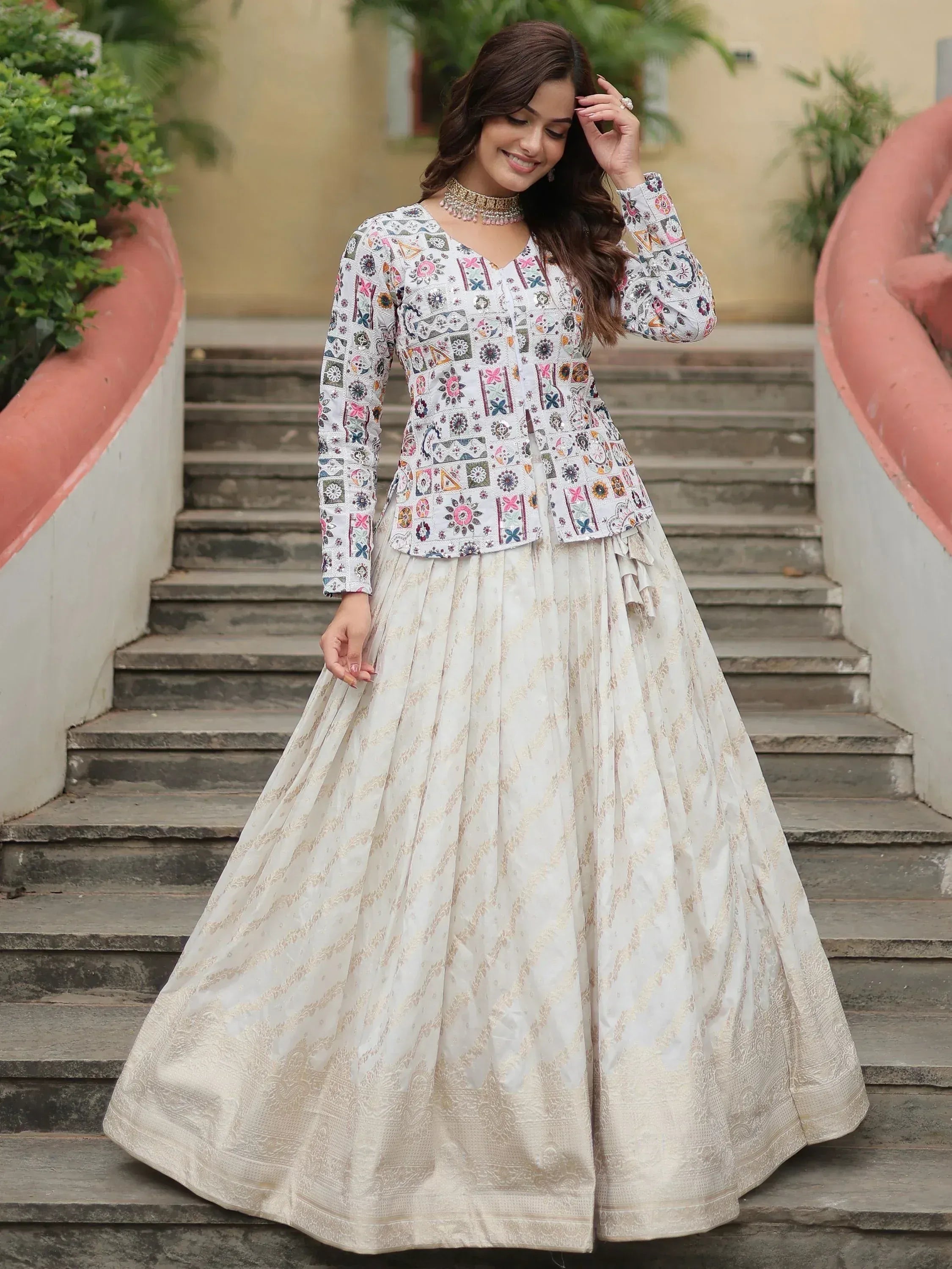 White embroidered lehenga choli with floral jacket, ideal for Indian ethnic wear occasions