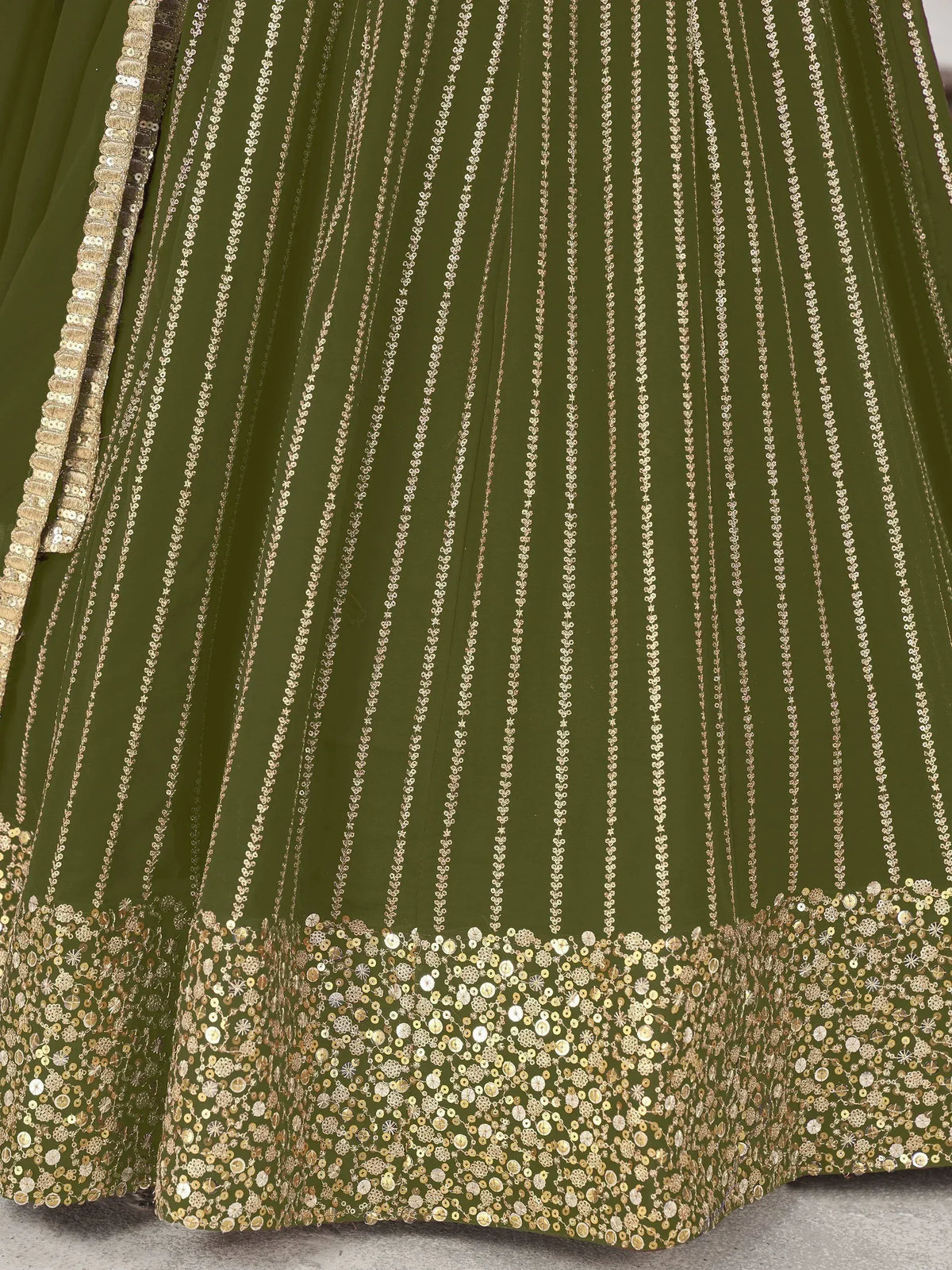 Olive green lehenga with gold sequin embroidery and floral patterns, perfect for Indian ethnic wear.