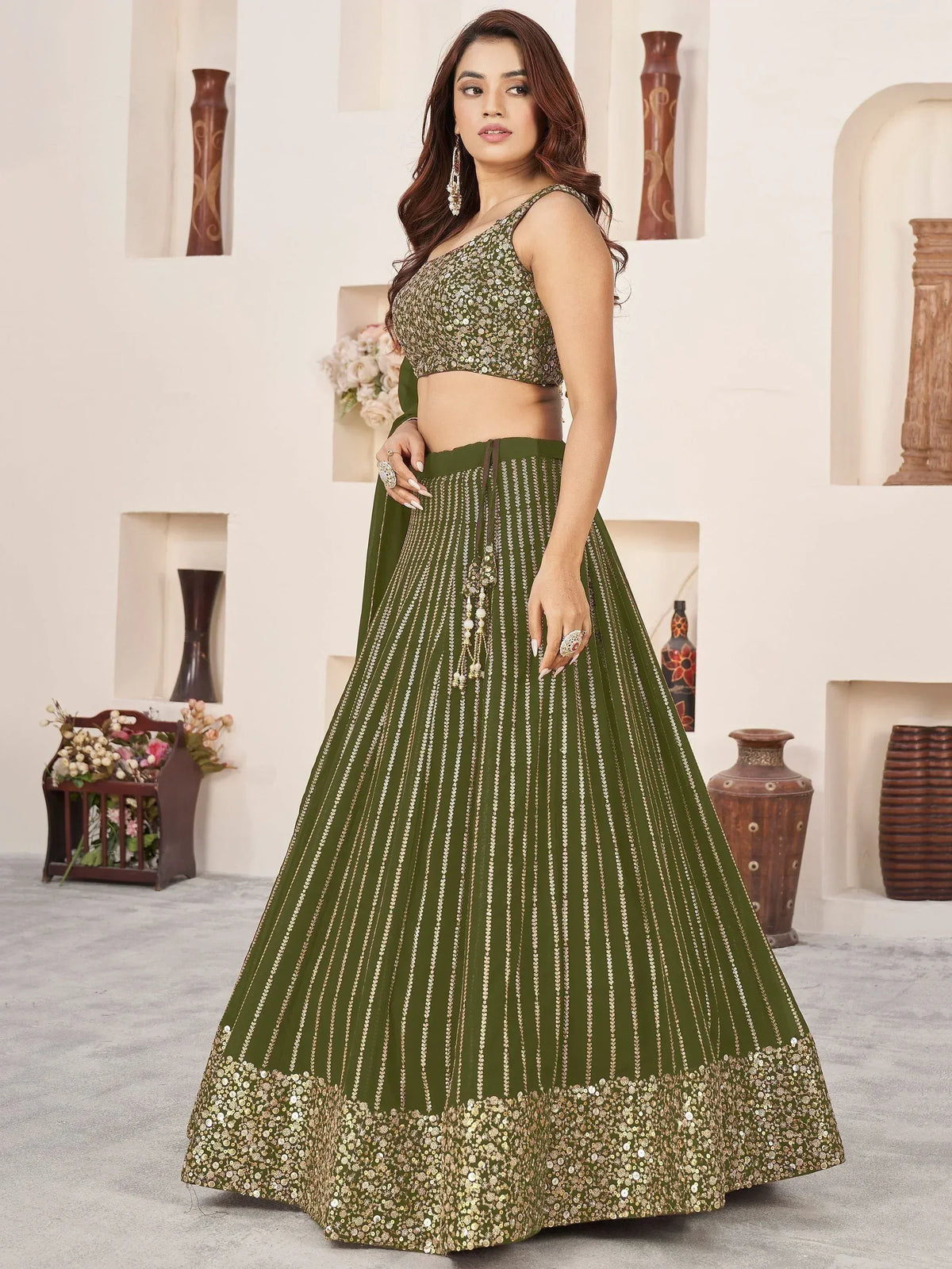 Olive green designer lehenga choli with sequin work, perfect for Indian ethnic wear and festive occasions.