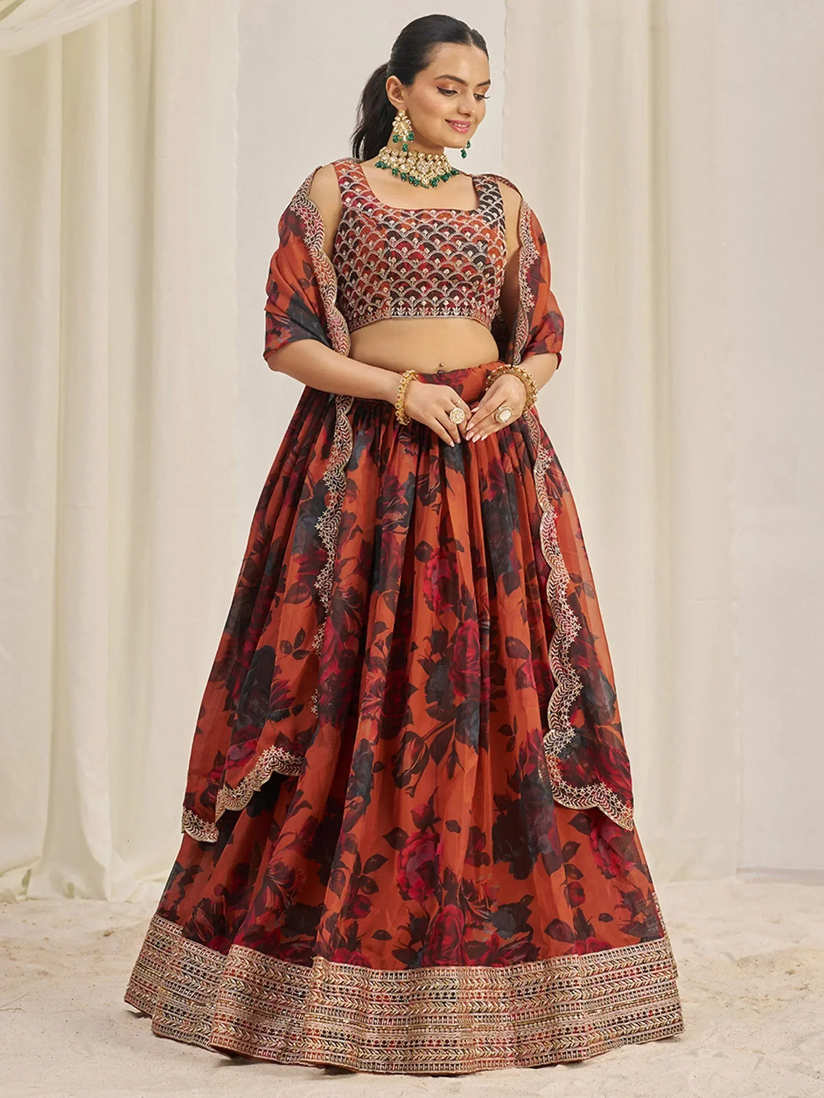 Elegant floral lehenga choli with intricate embroidery and matching dupatta for Indian ethnic wear