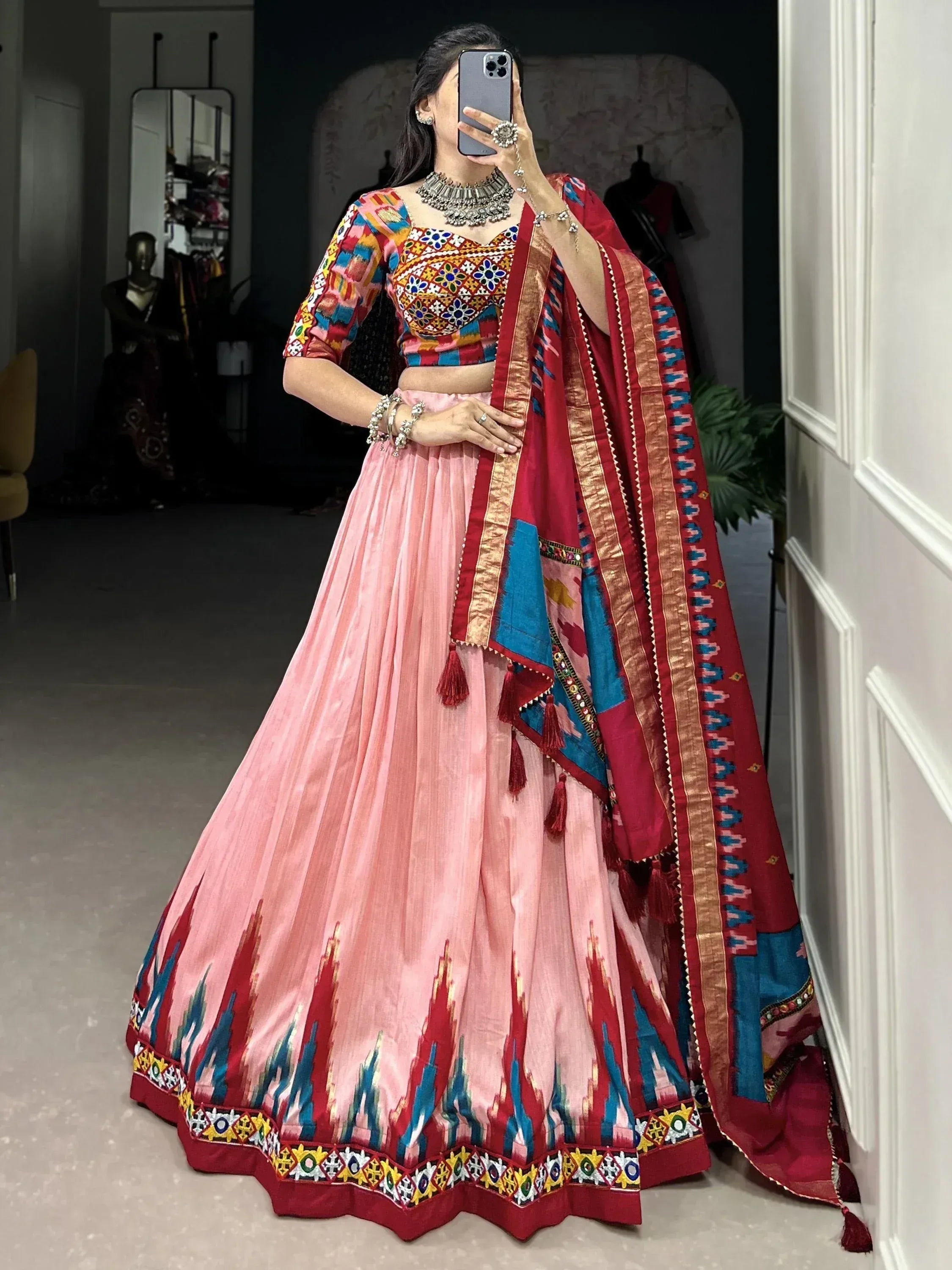 Pink and red embroidered lehenga choli with colorful dupatta, Indian ethnic wear for women