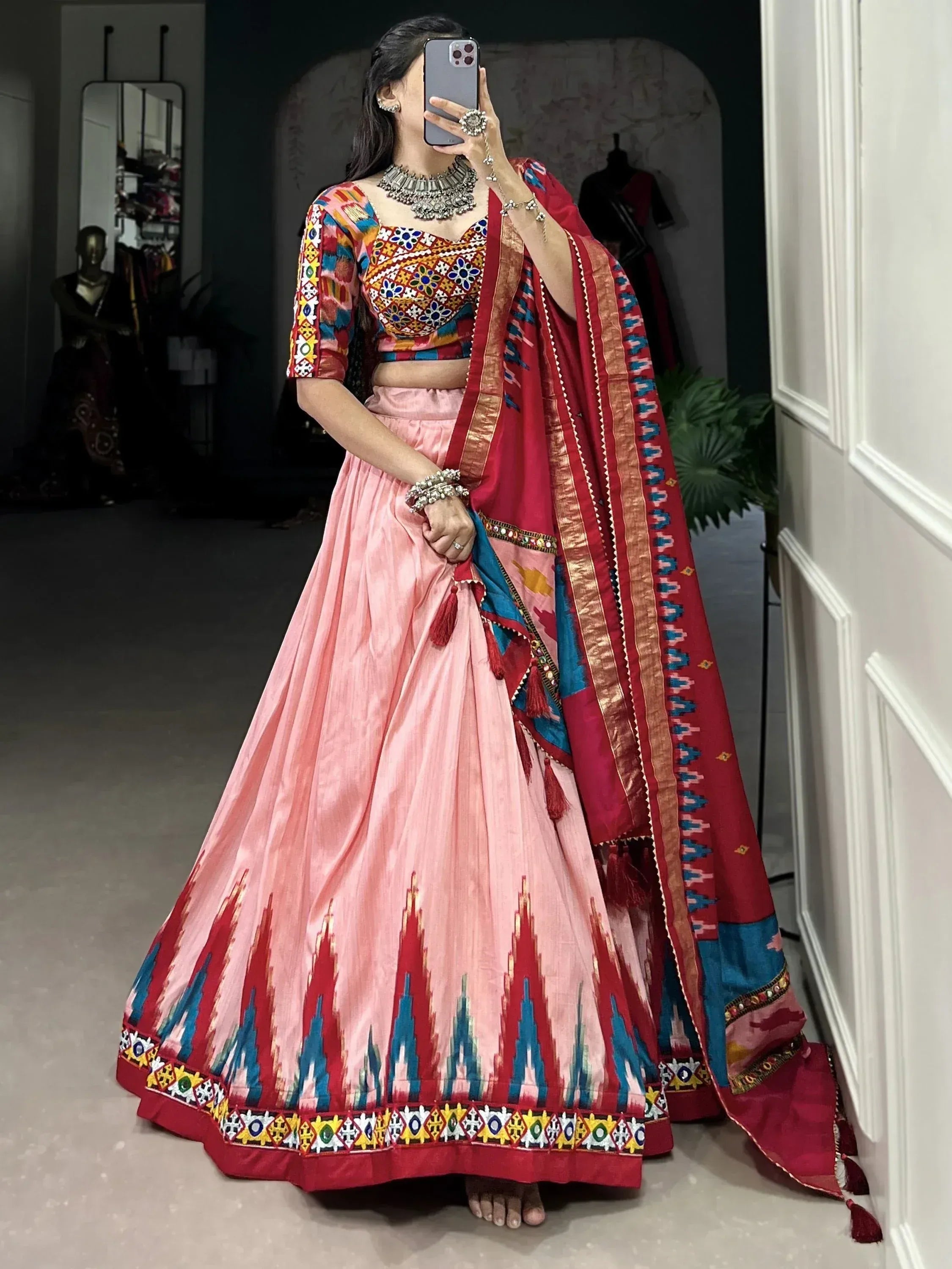 Pink lehenga choli with colorful embroidery and red dupatta, Indian ethnic wear for women