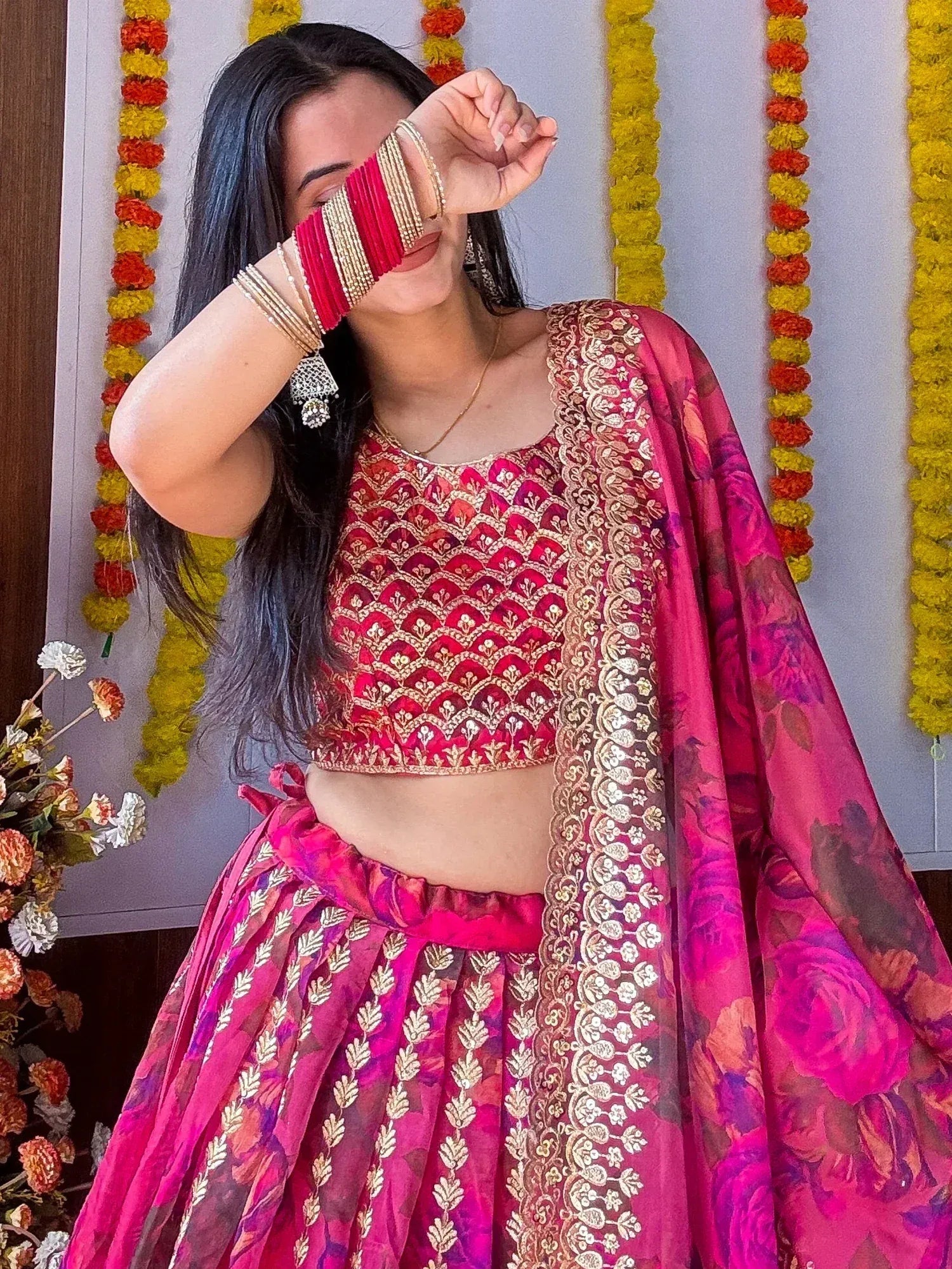 Pink embroidered lehenga choli with floral dupatta, perfect for Indian ethnic occasions and festivals.