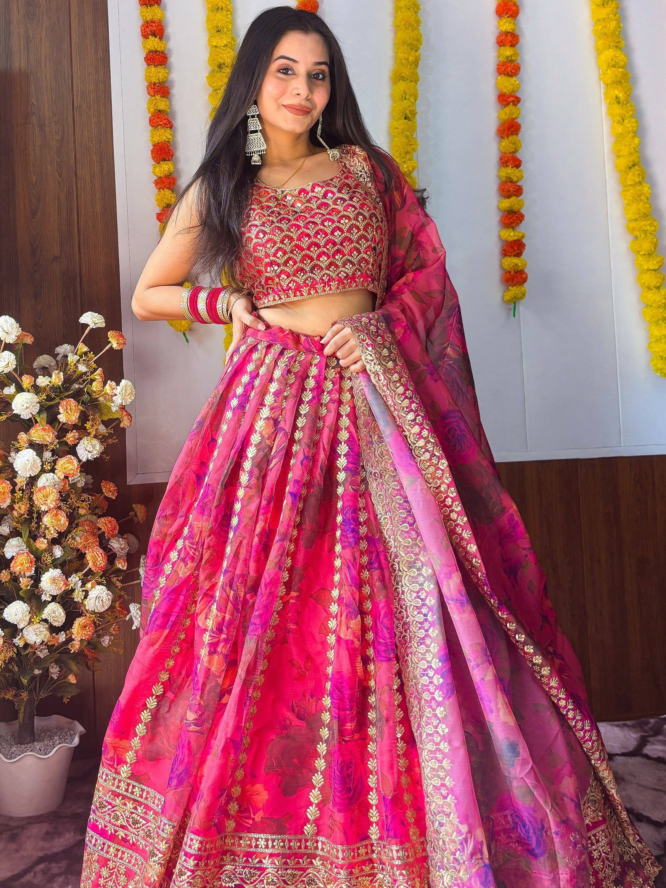 Pink floral lehenga choli with gold embroidery, perfect for Indian weddings and festive occasions.