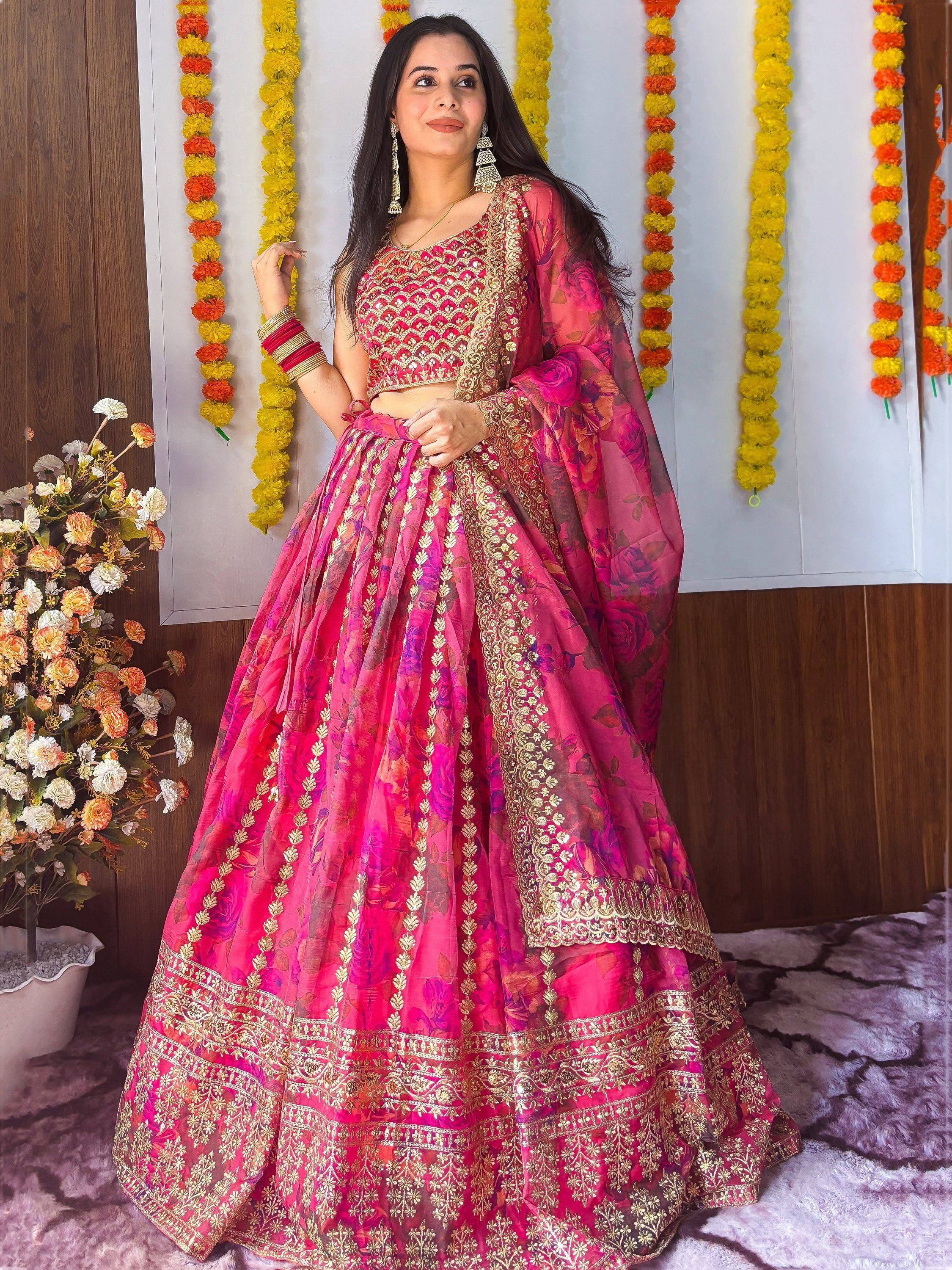 Pink floral lehenga choli with gold embroidery, perfect for Indian weddings and festive occasions.
