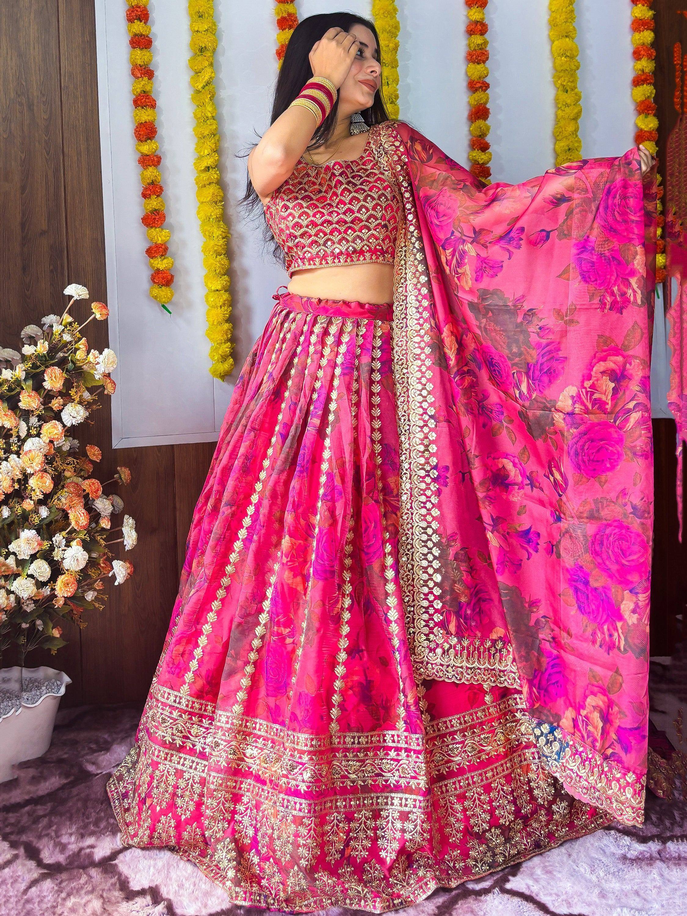 Pink floral lehenga choli with gold embroidery, perfect for Indian weddings and festive occasions.