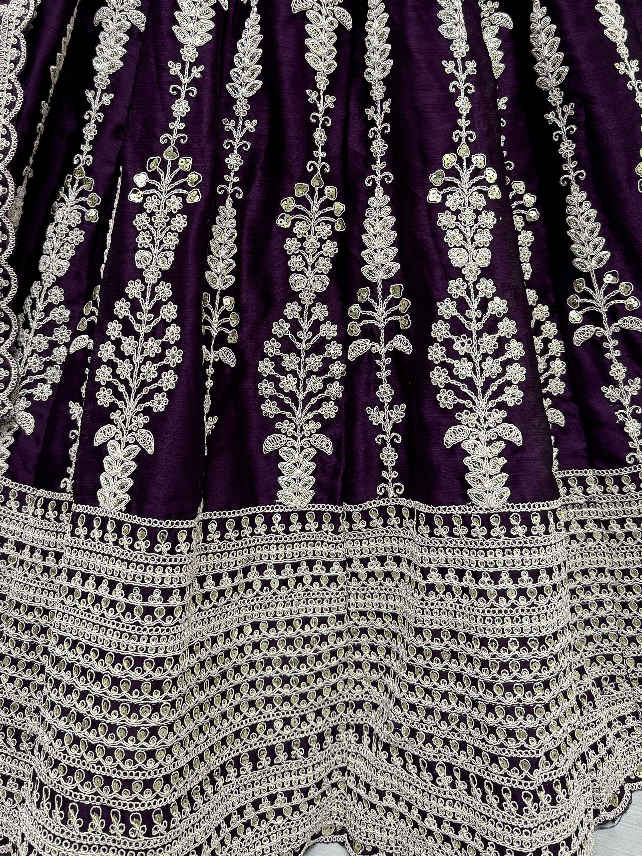 Purple ethnic gown with silver floral embroidery and sequin detailing for festive occasions