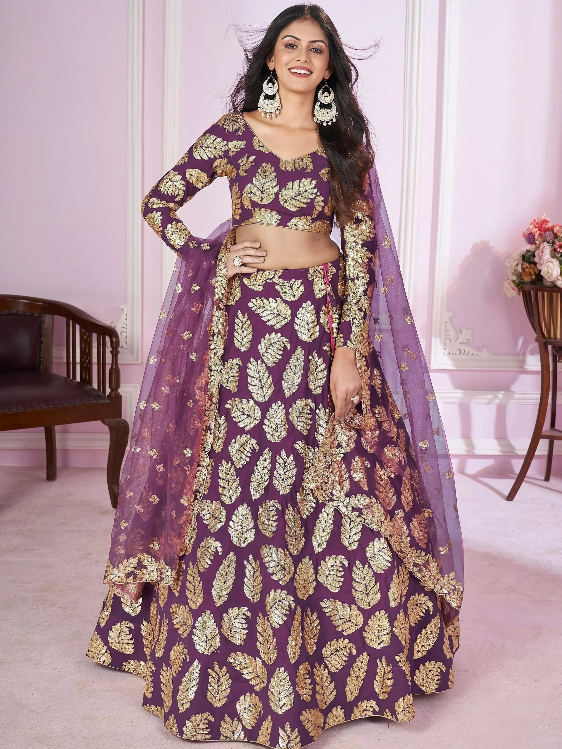 Purple lehenga choli with gold leaf embroidery, perfect for Indian ethnic wear and festive occasions.