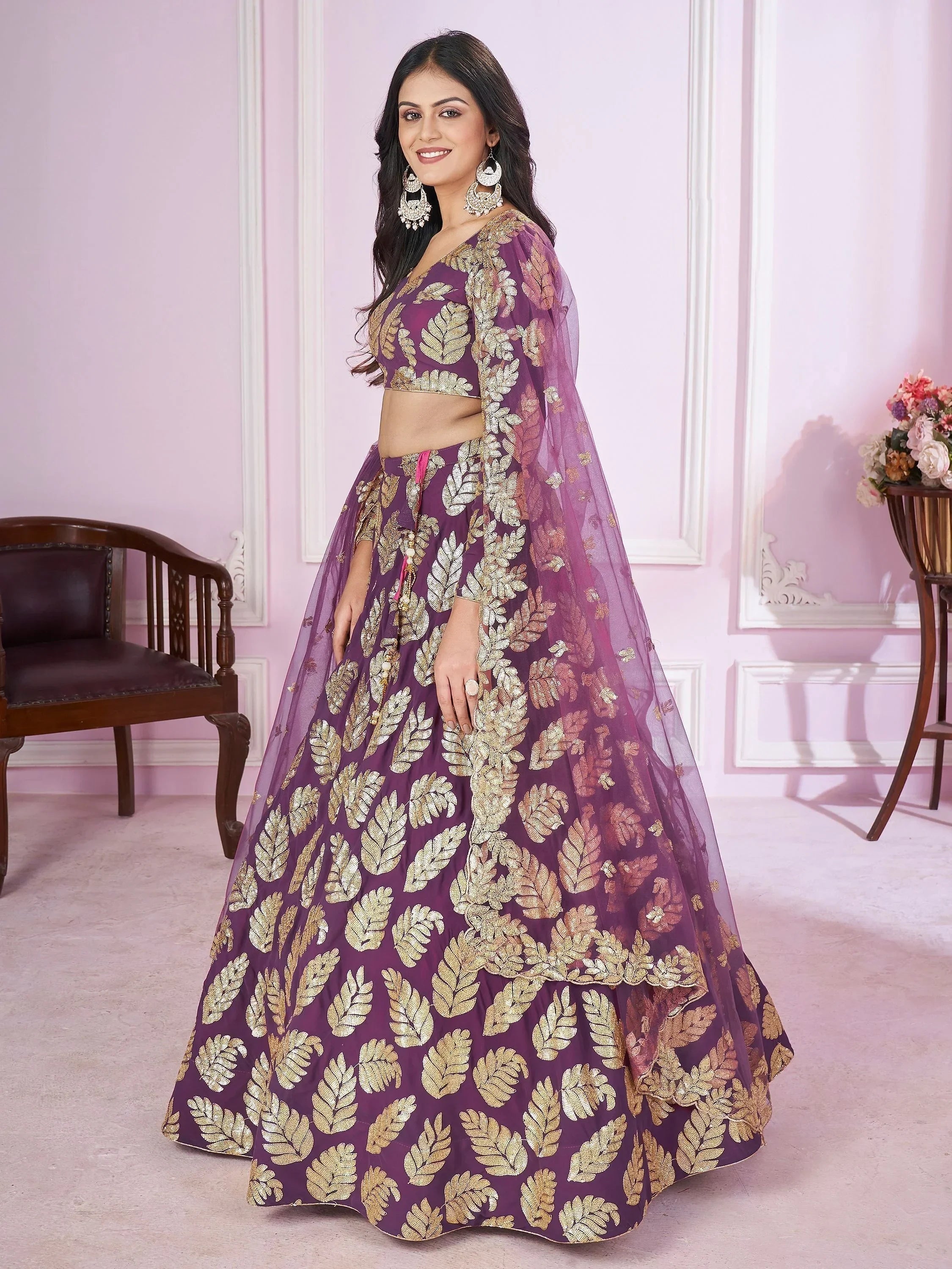 Purple lehenga choli with gold leaf embroidery, perfect for Indian weddings and festive occasions