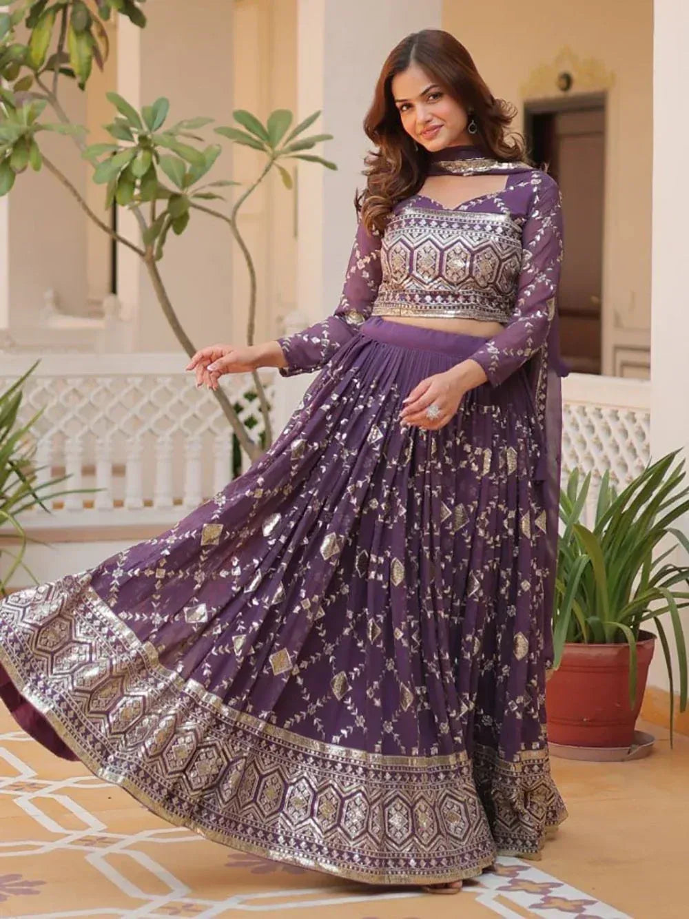 Purple embroidered lehenga choli with geometric patterns, perfect for Indian ethnic wear occasions.