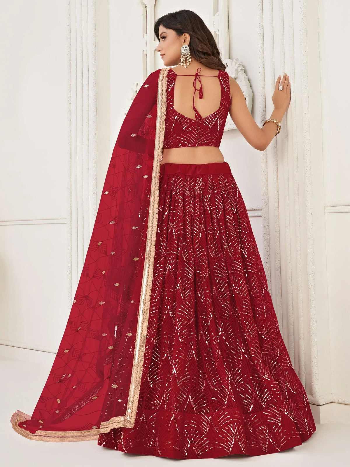 Red sequin lehenga choli with gold trim, back view, Indian ethnic wear
