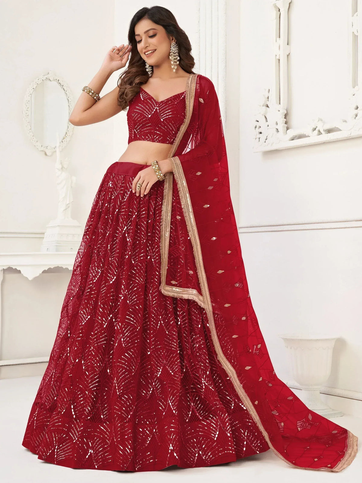 Red sequined lehenga choli with gold trim, Indian ethnic wear for weddings and parties