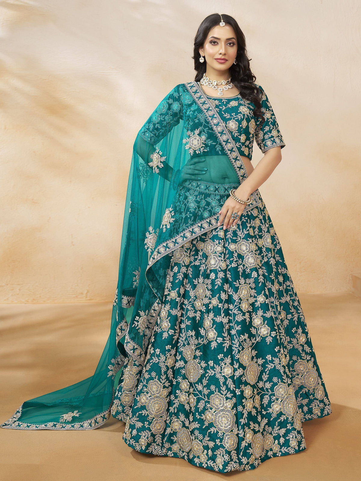 Teal green embroidered lehenga choli with floral gold work and sheer dupatta for Indian ethnic wear