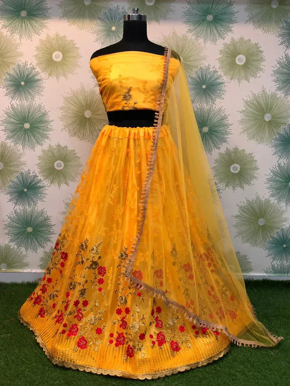 Yellow floral embroidered lehenga choli with matching dupatta, perfect for Indian ethnic wear