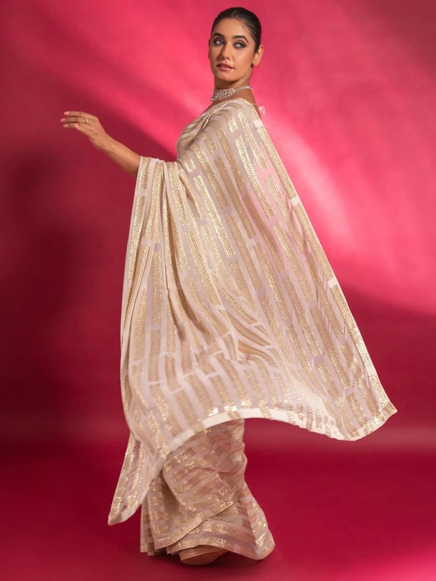 Stunning Ivory Sequins Georgette Designer Saree With Blouse