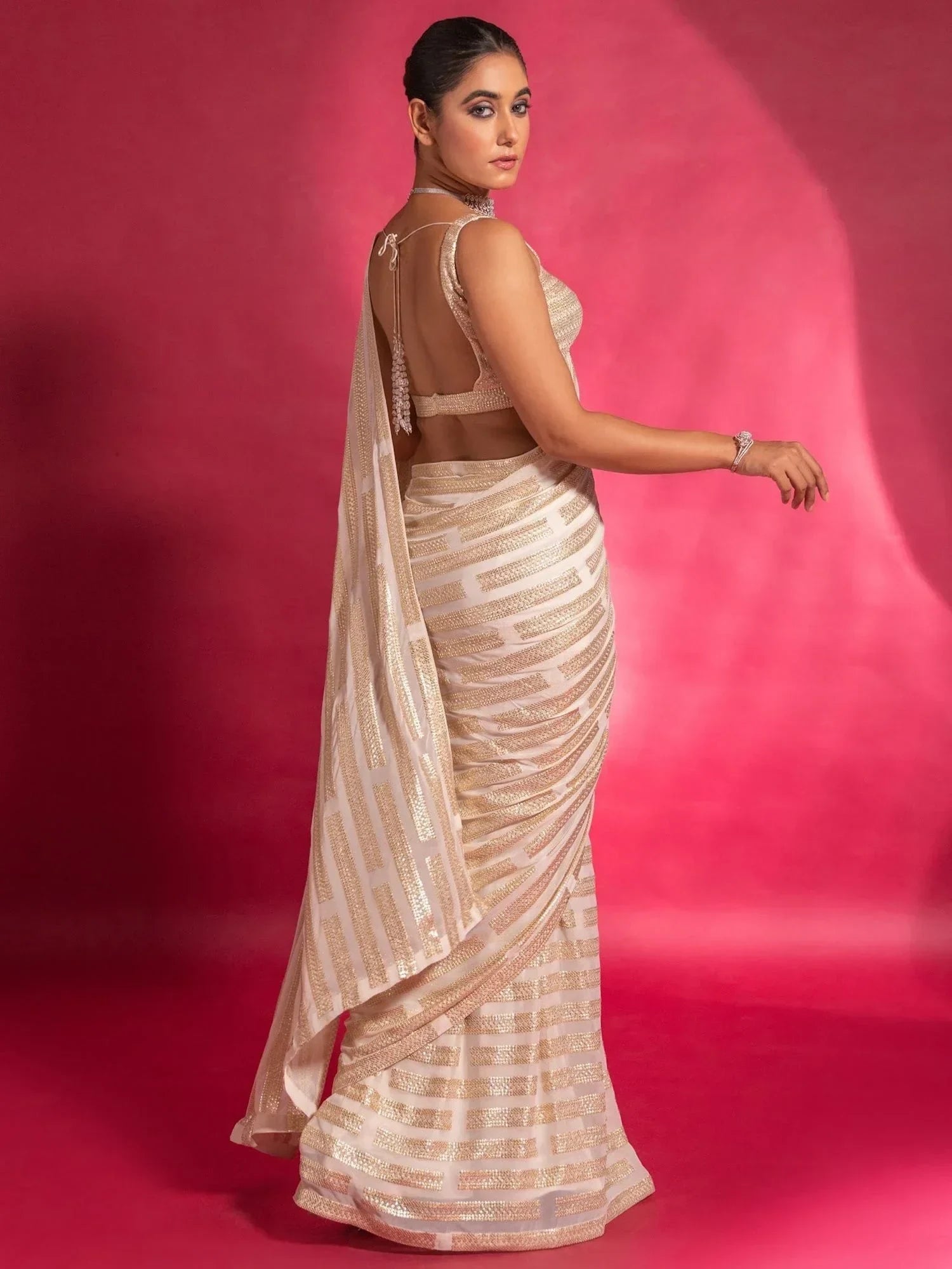 Stunning Ivory Sequins Georgette Designer Saree With Blouse