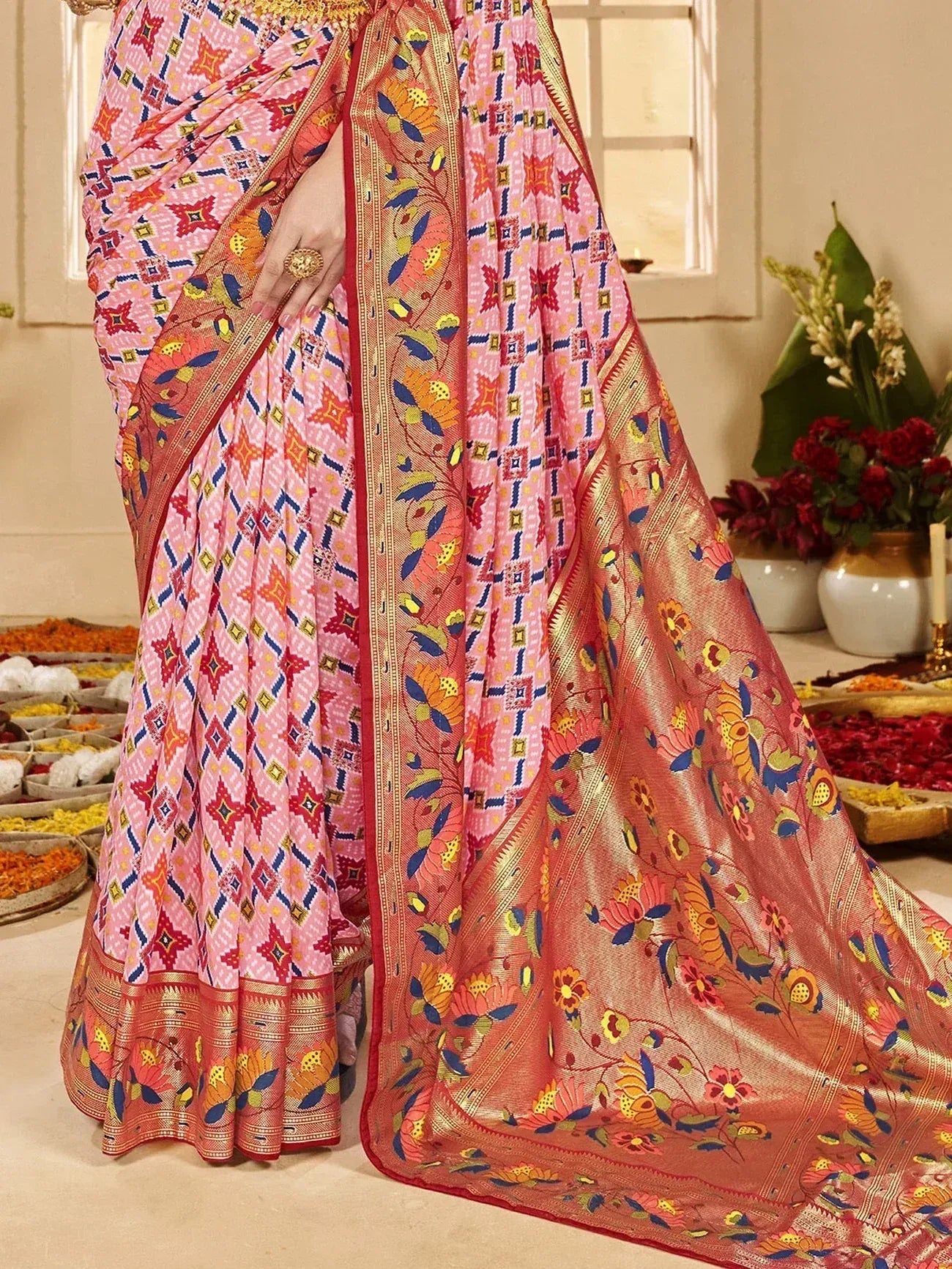 Pink printed saree with floral border, ethnic Indian wear for festivals and weddings