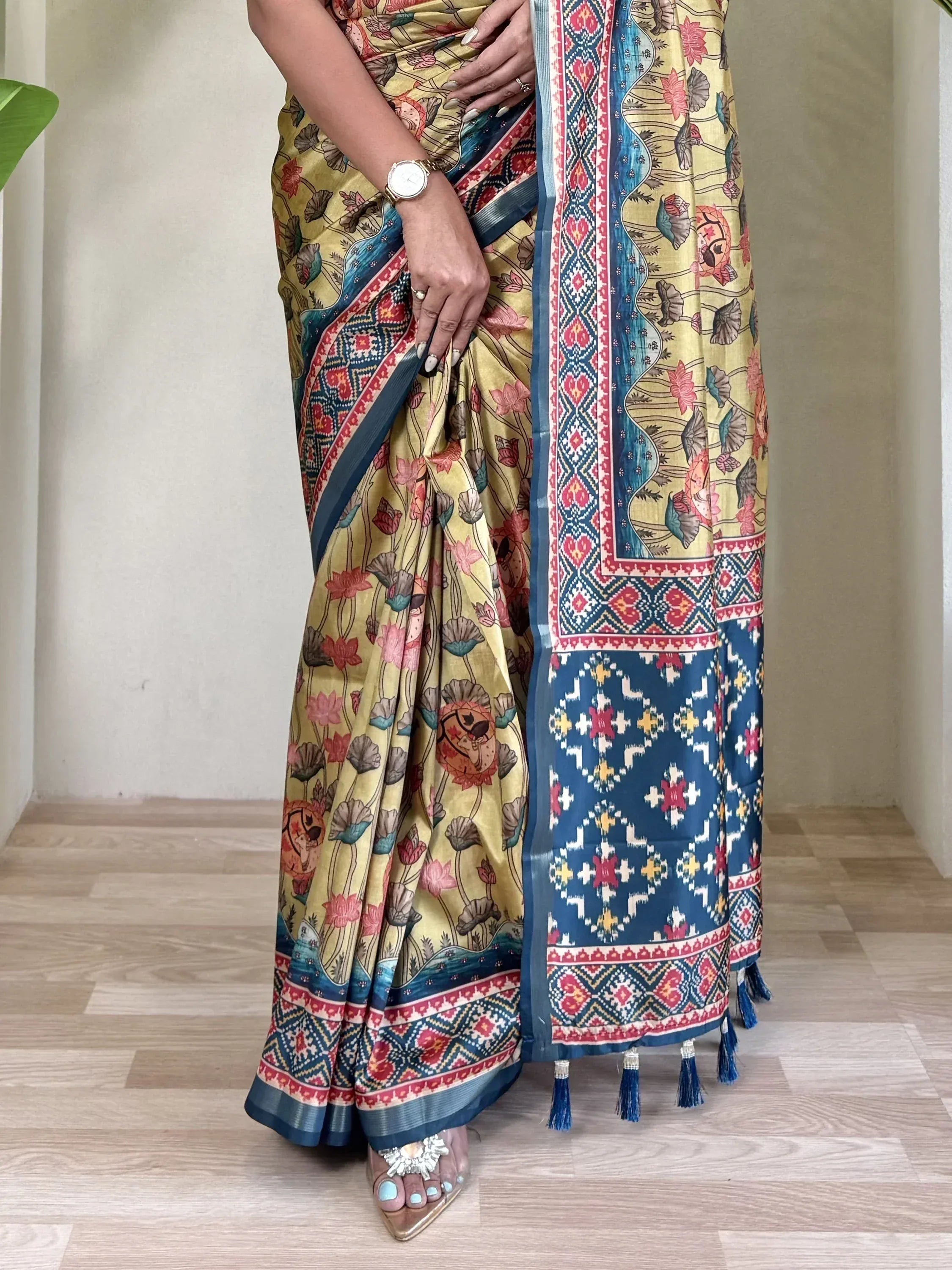 Yellow floral print saree with blue border and tassels, ethnic Indian wear