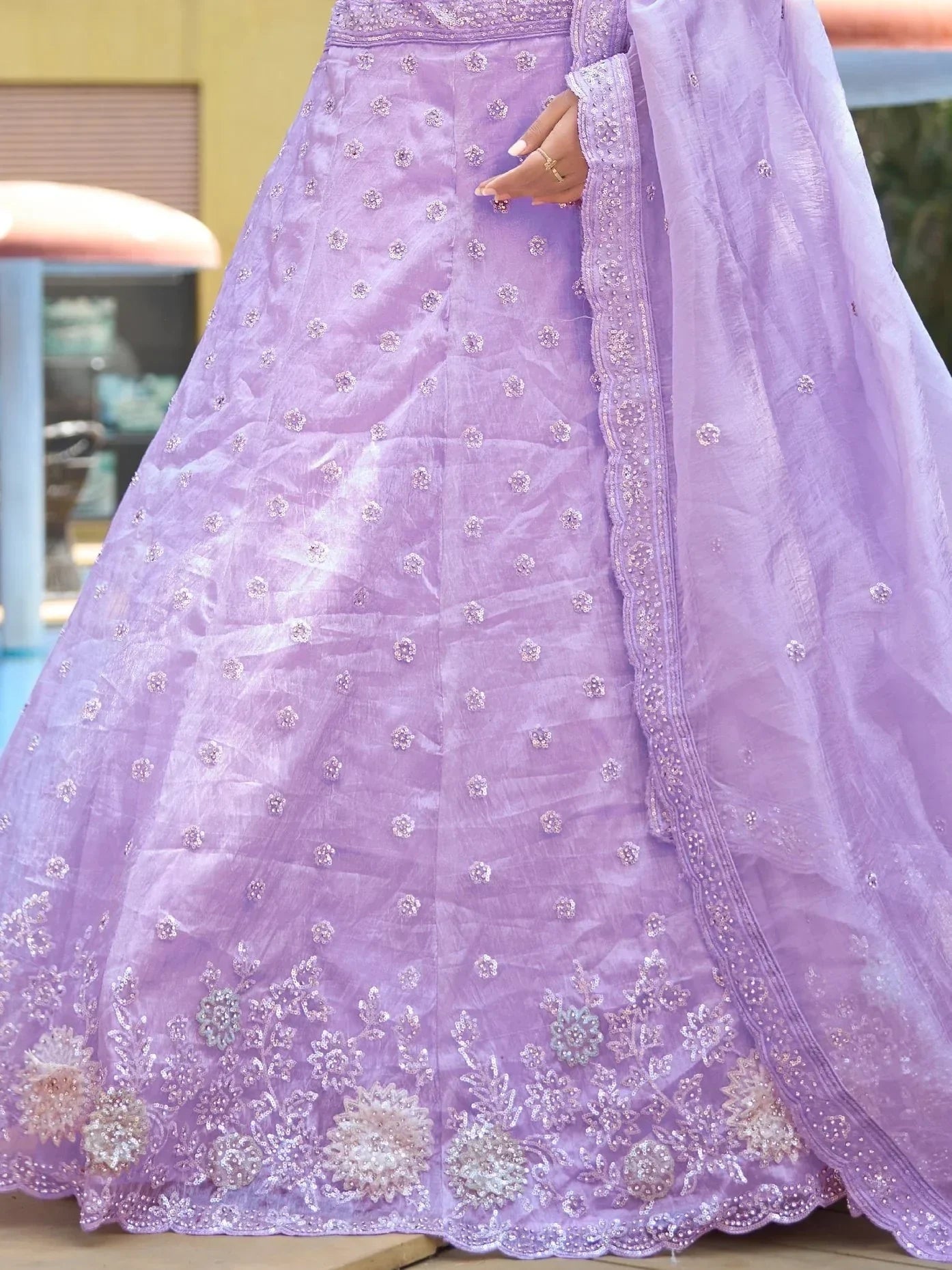 Lavender designer lehenga choli with floral embroidery and sequin detailing, perfect for Indian ethnic wear.