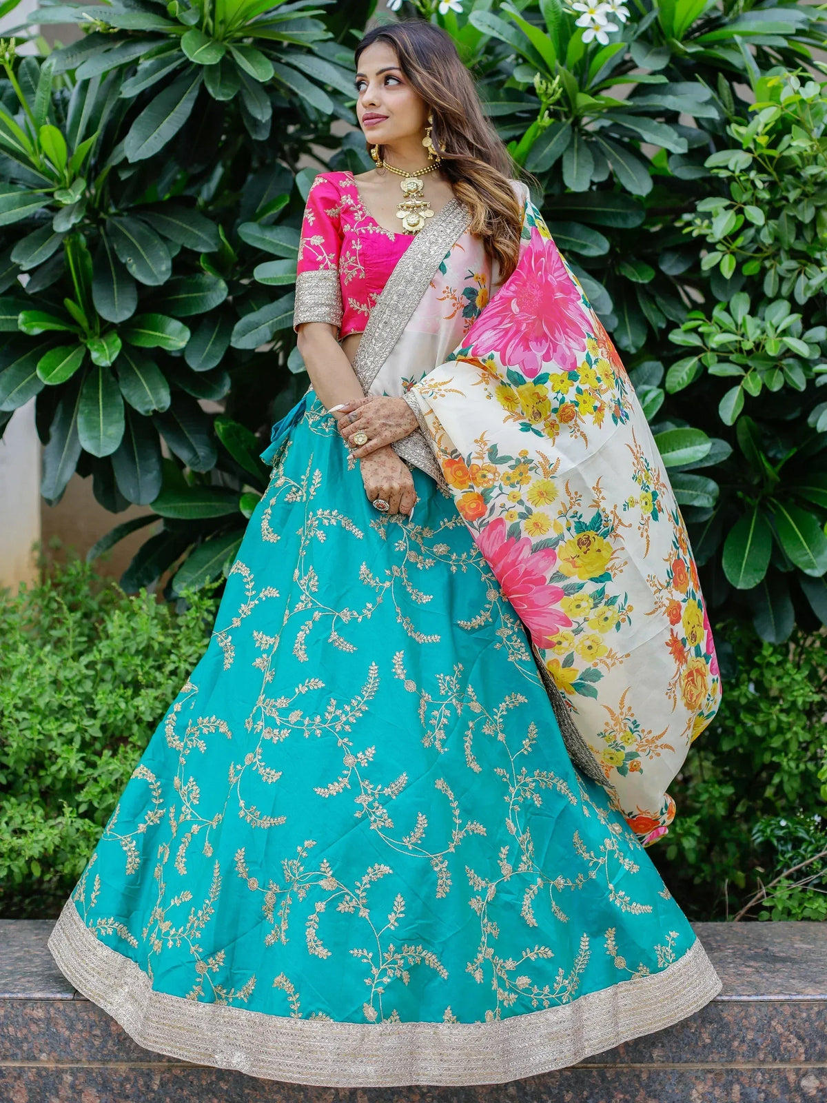Teal lehenga with gold embroidery, pink blouse, floral dupatta, Indian ethnic wear