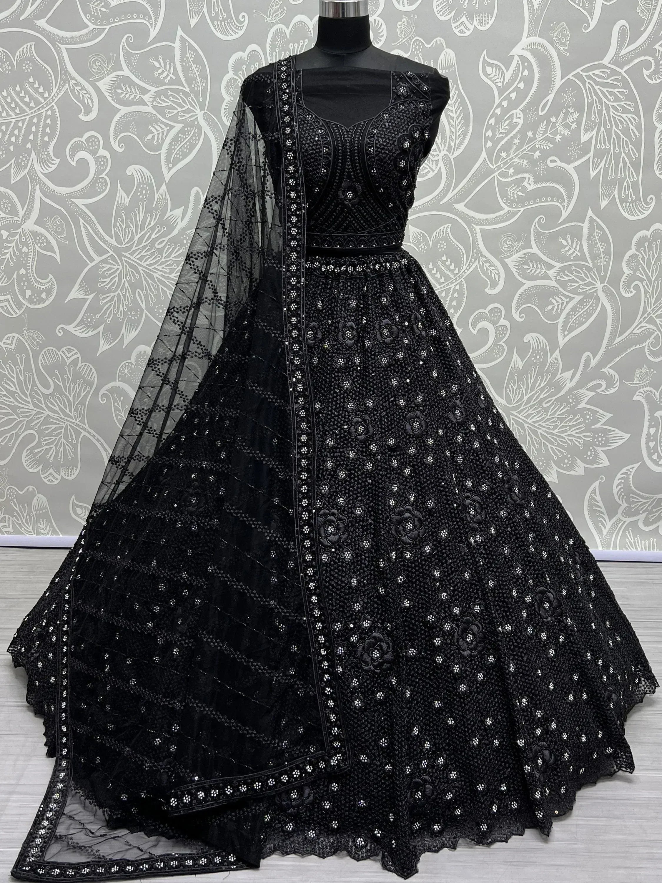 Black embroidered lehenga choli with floral motifs and sheer dupatta, Indian ethnic wear