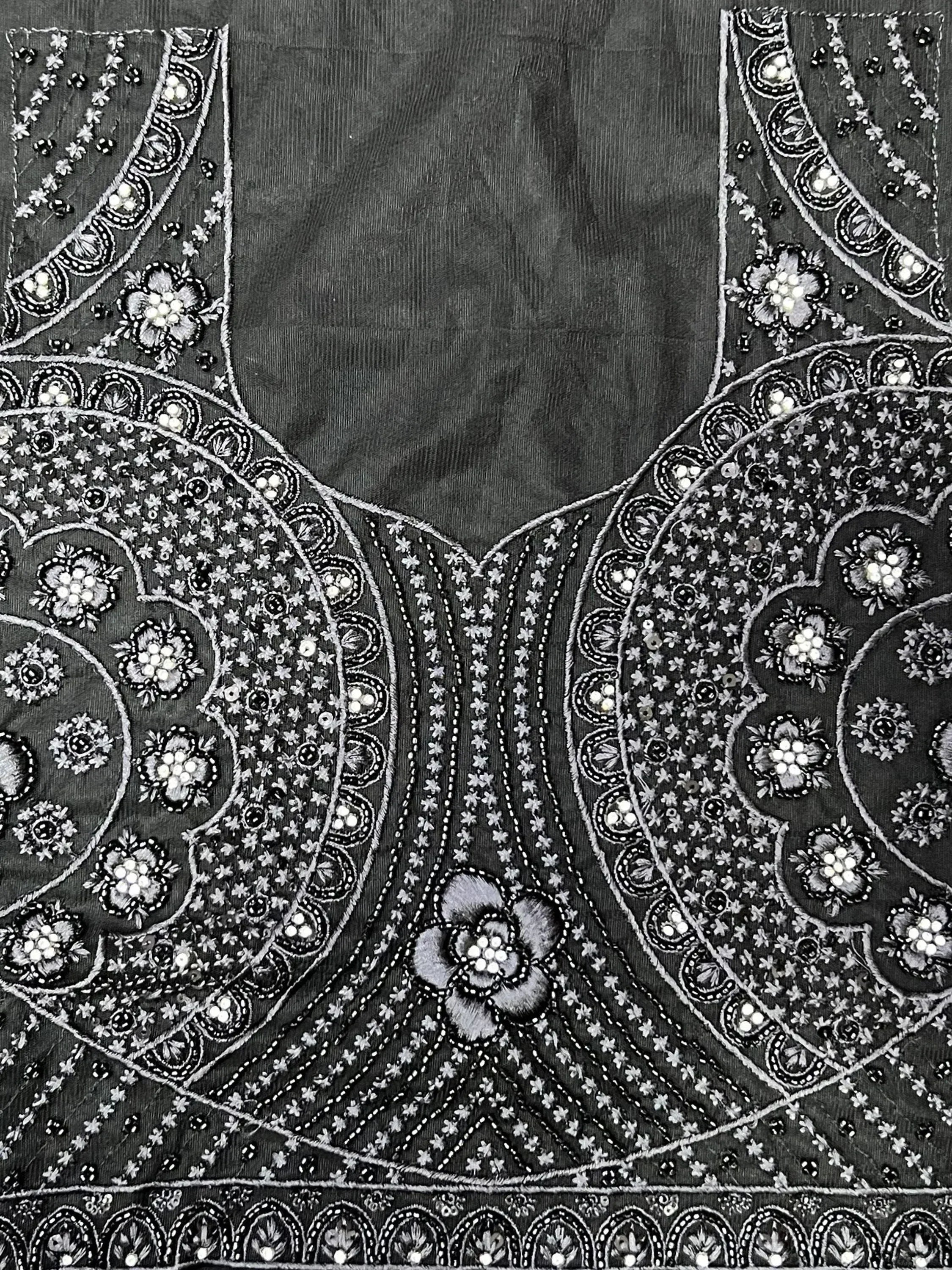Black ethnic blouse with intricate silver embroidery and beadwork, perfect for lehenga choli or saree