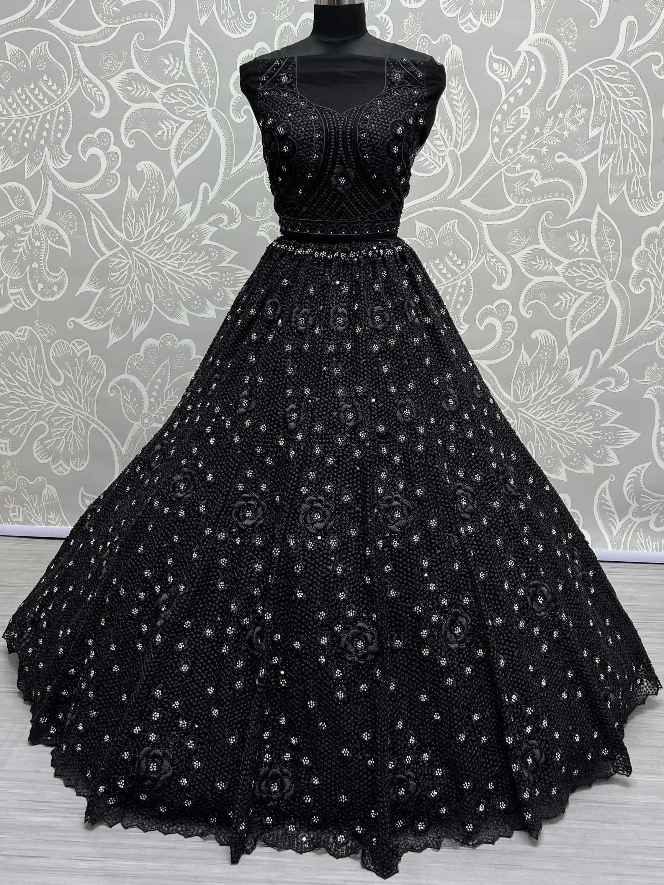 Black embroidered ethnic gown with floral sequin detailing, perfect for festive occasions and weddings.