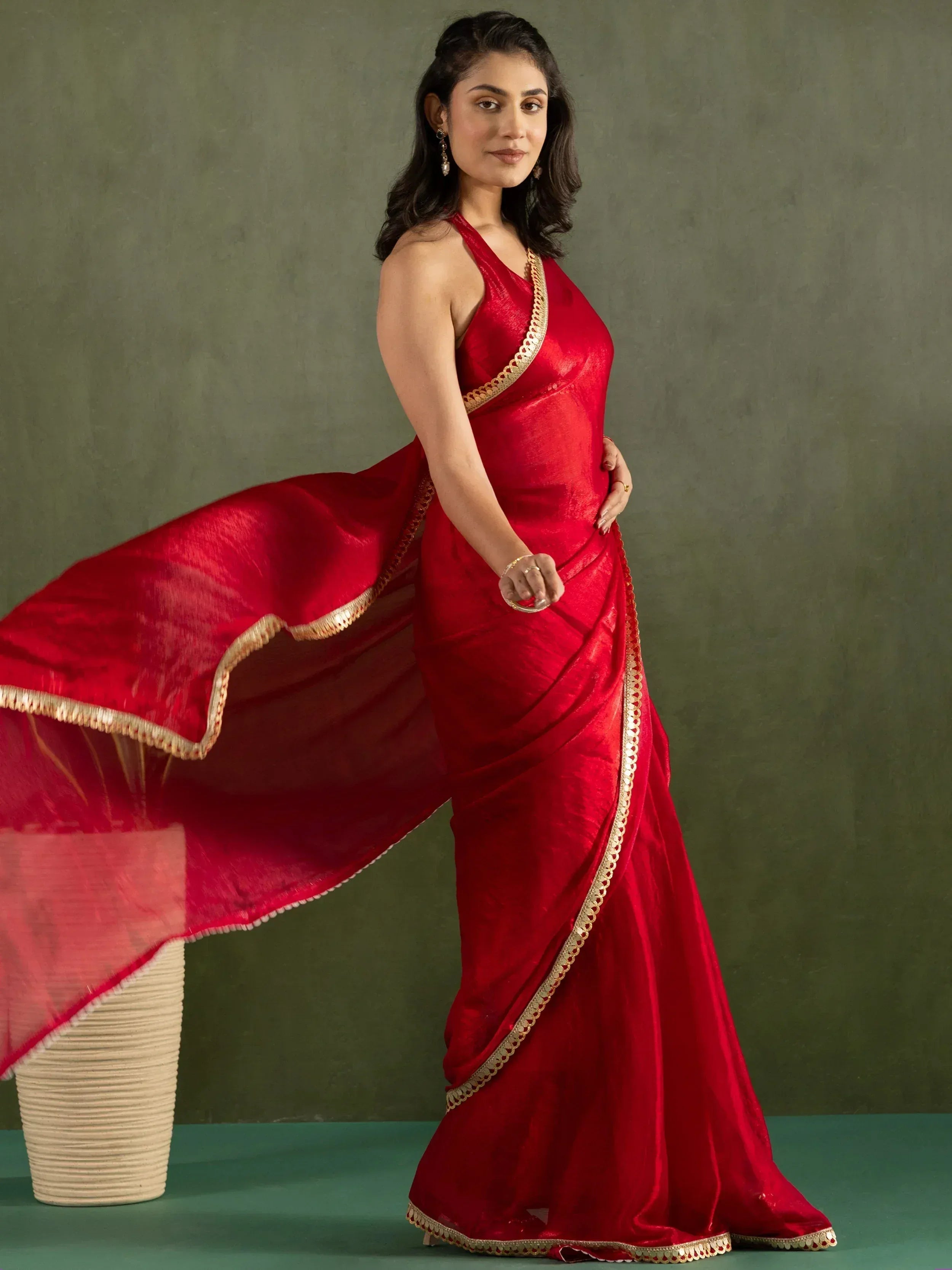 Red ethnic saree with gold border, stylish Indian wear for women