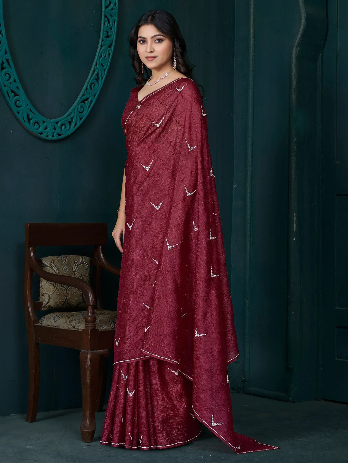 Maroon ethnic saree with white embroidery, perfect for Indian occasions and festive wear