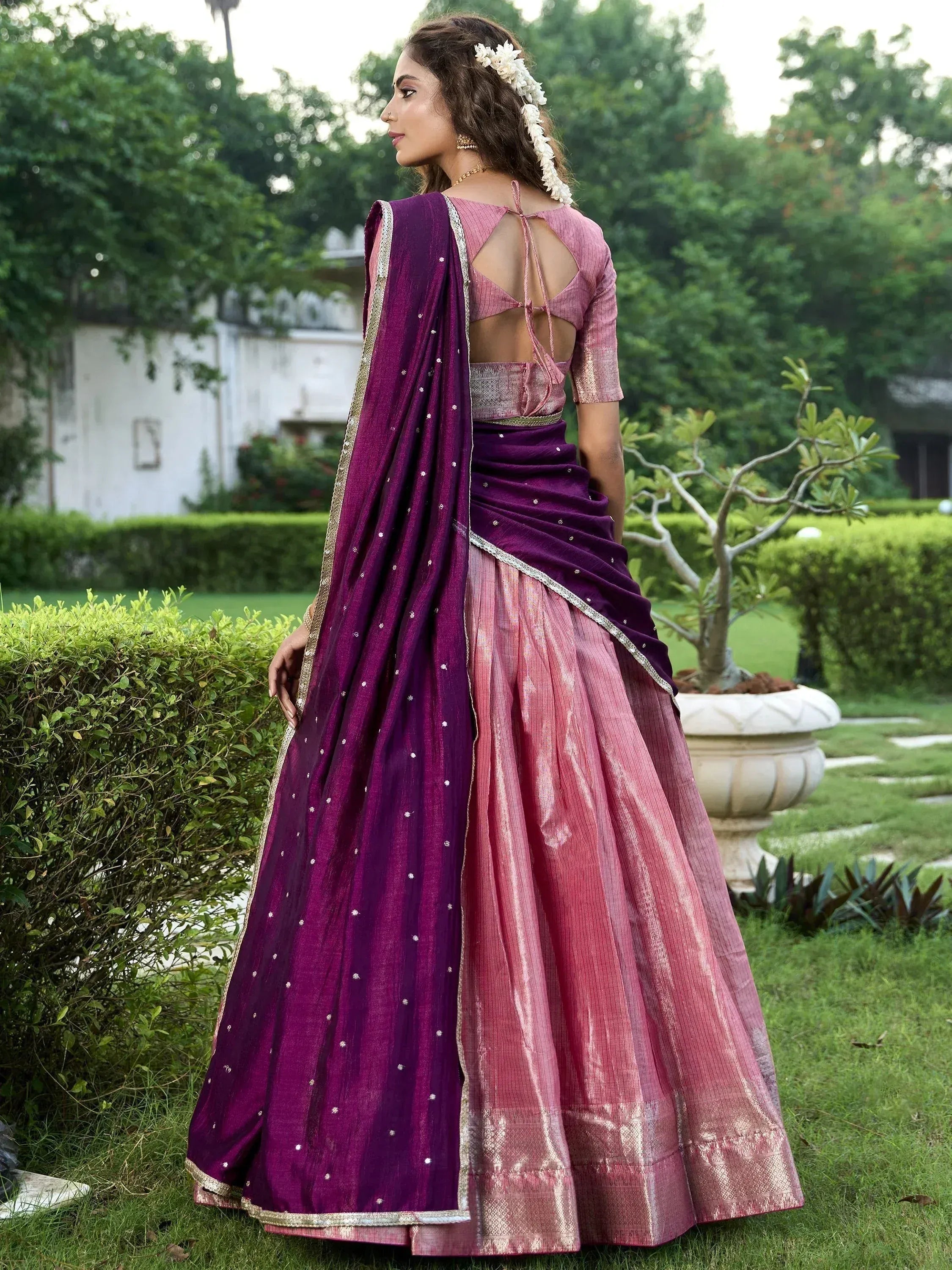 Purple and pink designer lehenga choli with open back blouse, perfect for Indian ethnic wear occasions