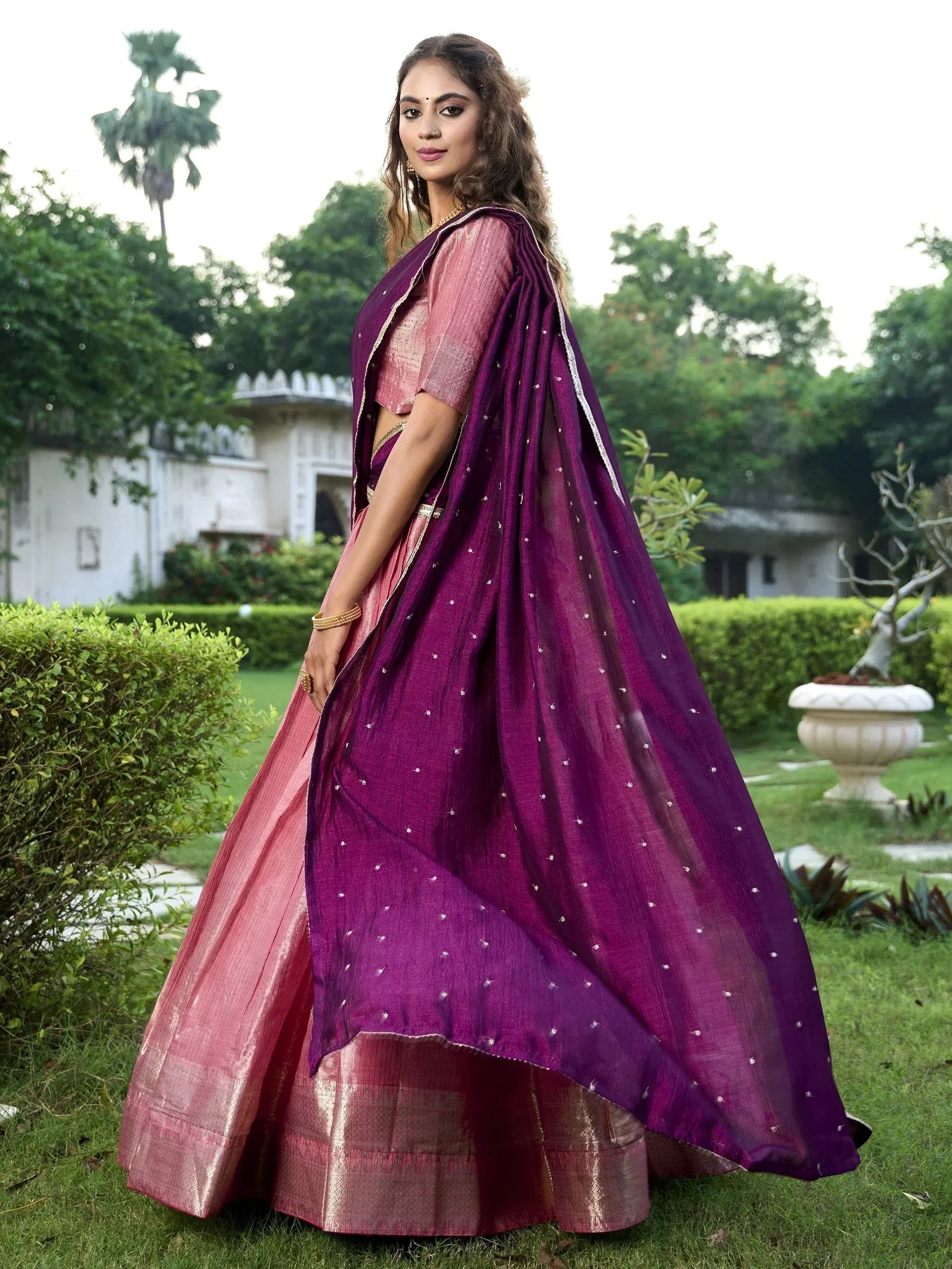 Purple and pink designer lehenga choli with embroidered dupatta, perfect for Indian ethnic occasions