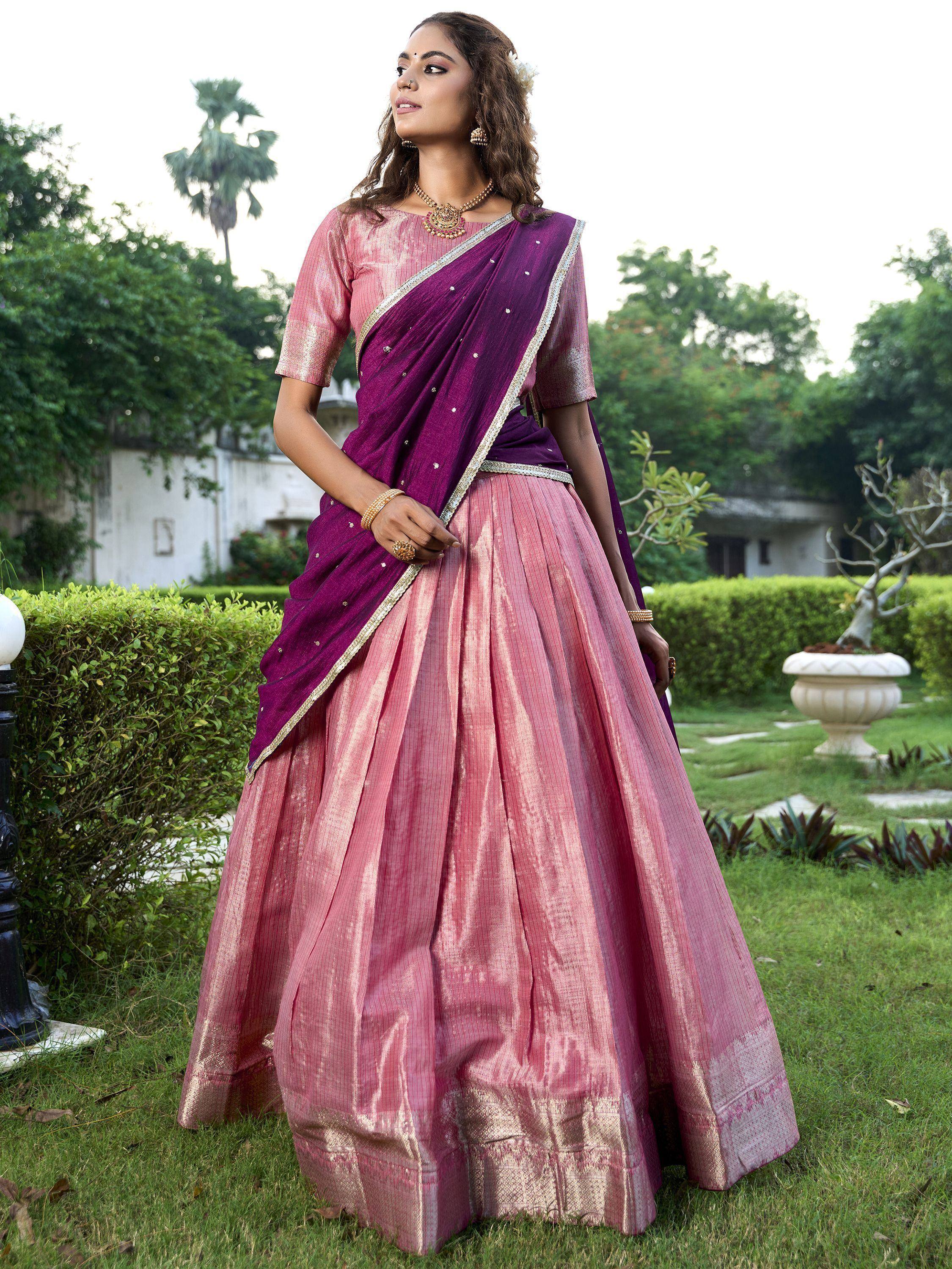 Elegant purple and pink lehenga choli with gold trim, perfect for Indian ethnic occasions